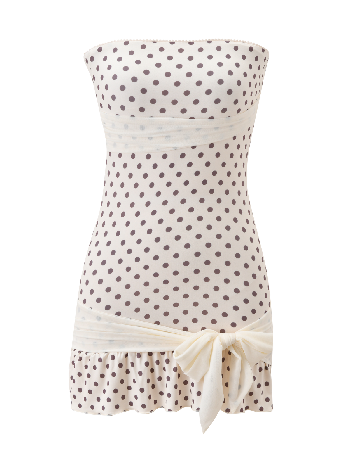The TIGERMIST TOVE MINI DRESS in white polka dot features a strapless design, wide cream waistband, playful ruffle hem, and a large cream bow at the bottom.