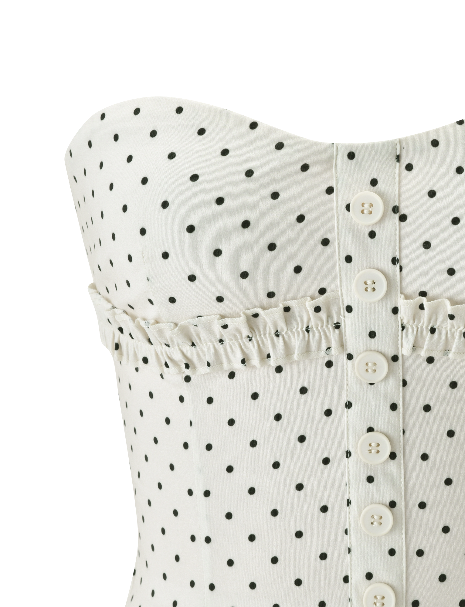 Close-up of the TIGERMIST KITTIE STRAPLESS CORSET in Cream Dot, featuring a white base with black polka dots, front button detail, and ruffled chest trim.