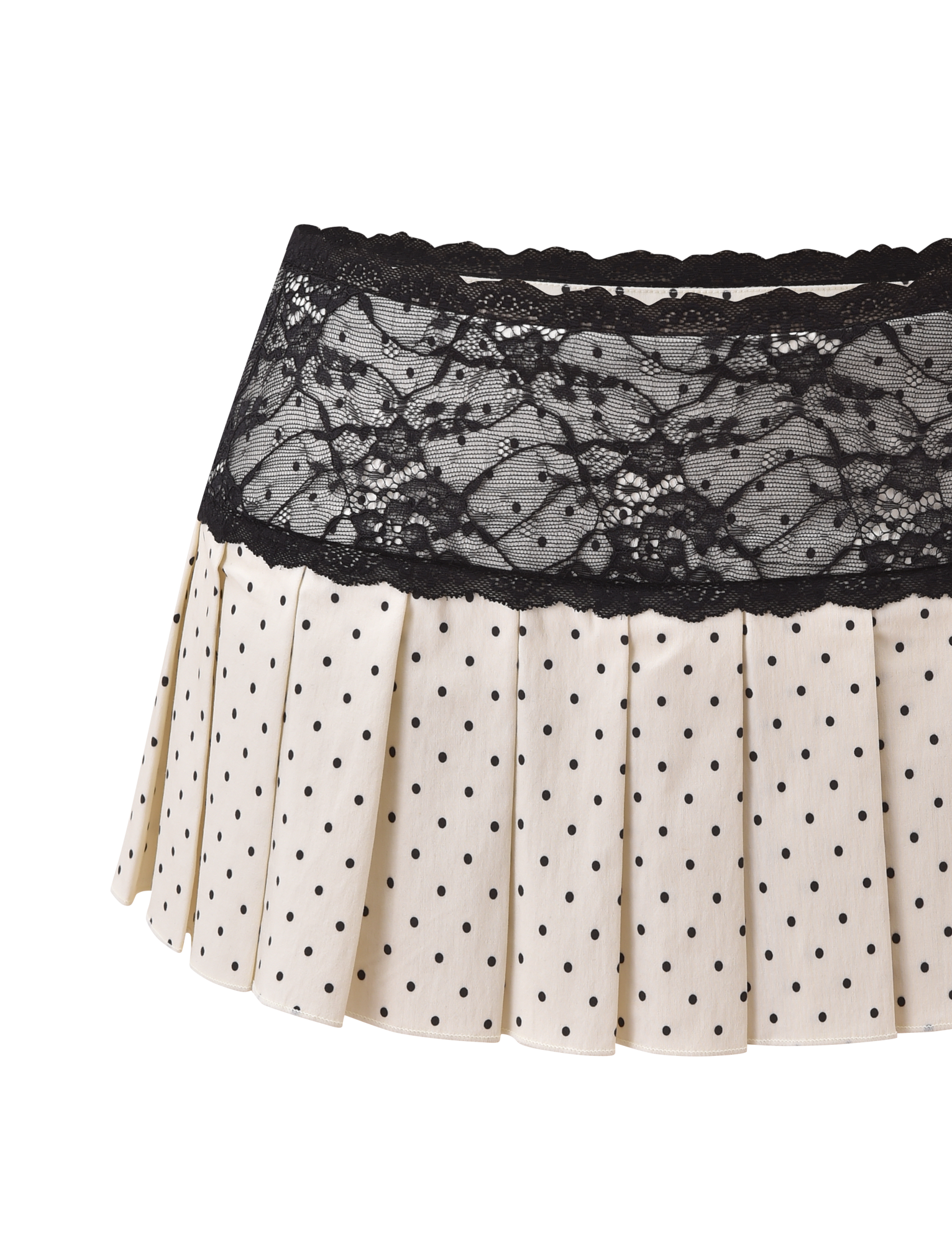 The KITTIE LACE SKORT - CREAM DOT by TIGERMIST features a cream base with black polka dots, a wide black lace waistband, and is made from stretch suiting fabric, shown against a white background.
