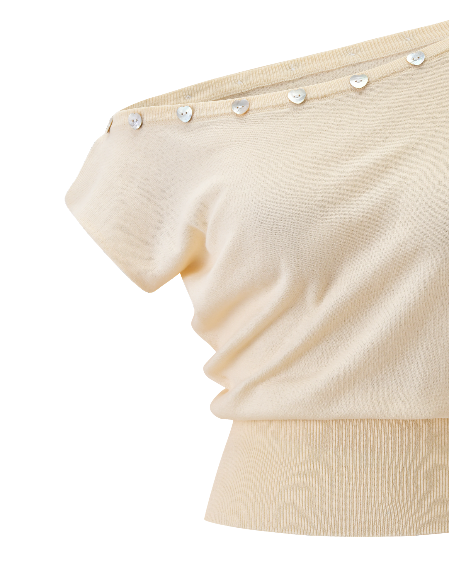 A close-up of the TIGERMIST TYLA SLEEVELESS KNIT TOP in cream, showcasing heart button details on the neckline, soft textured fabric, and a wide ribbed hem.