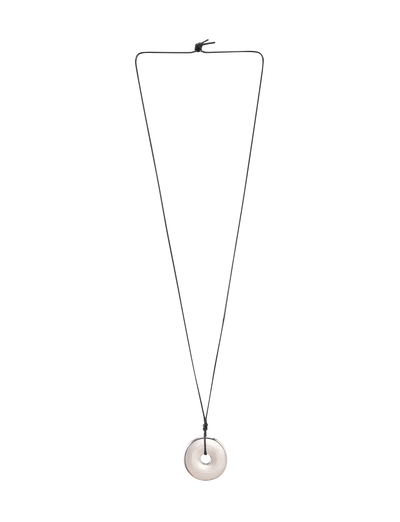 The AIFE PENDANT NECKLACE - SILVER by TIGERMIST features a minimalist design with a black adjustable cord and a round, light stone pendant with a central hole, shown against a plain white background.