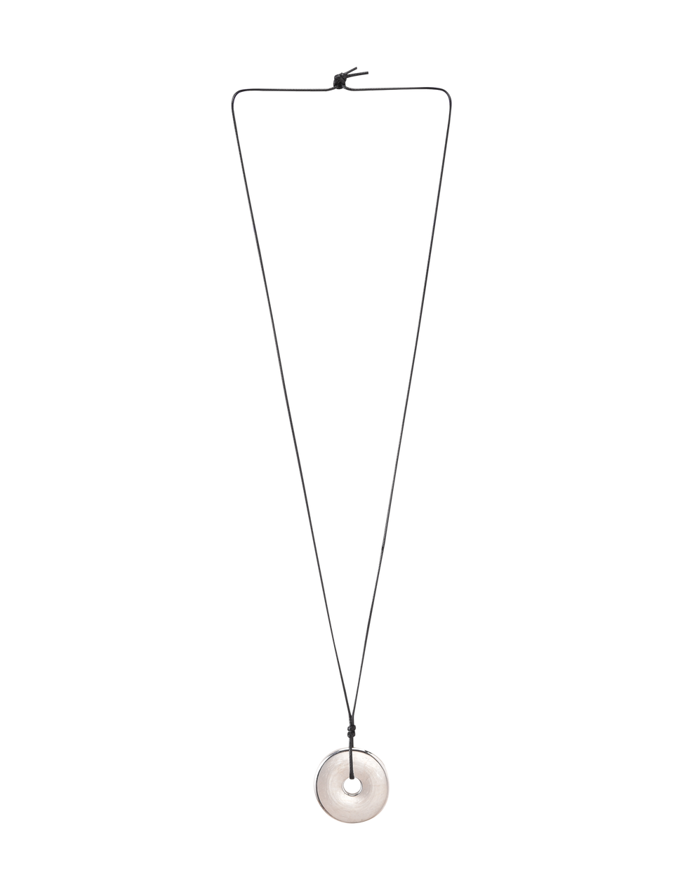 The AIFE PENDANT NECKLACE - SILVER by TIGERMIST features a minimalist design with a black adjustable cord and a round, light stone pendant with a central hole, shown against a plain white background.