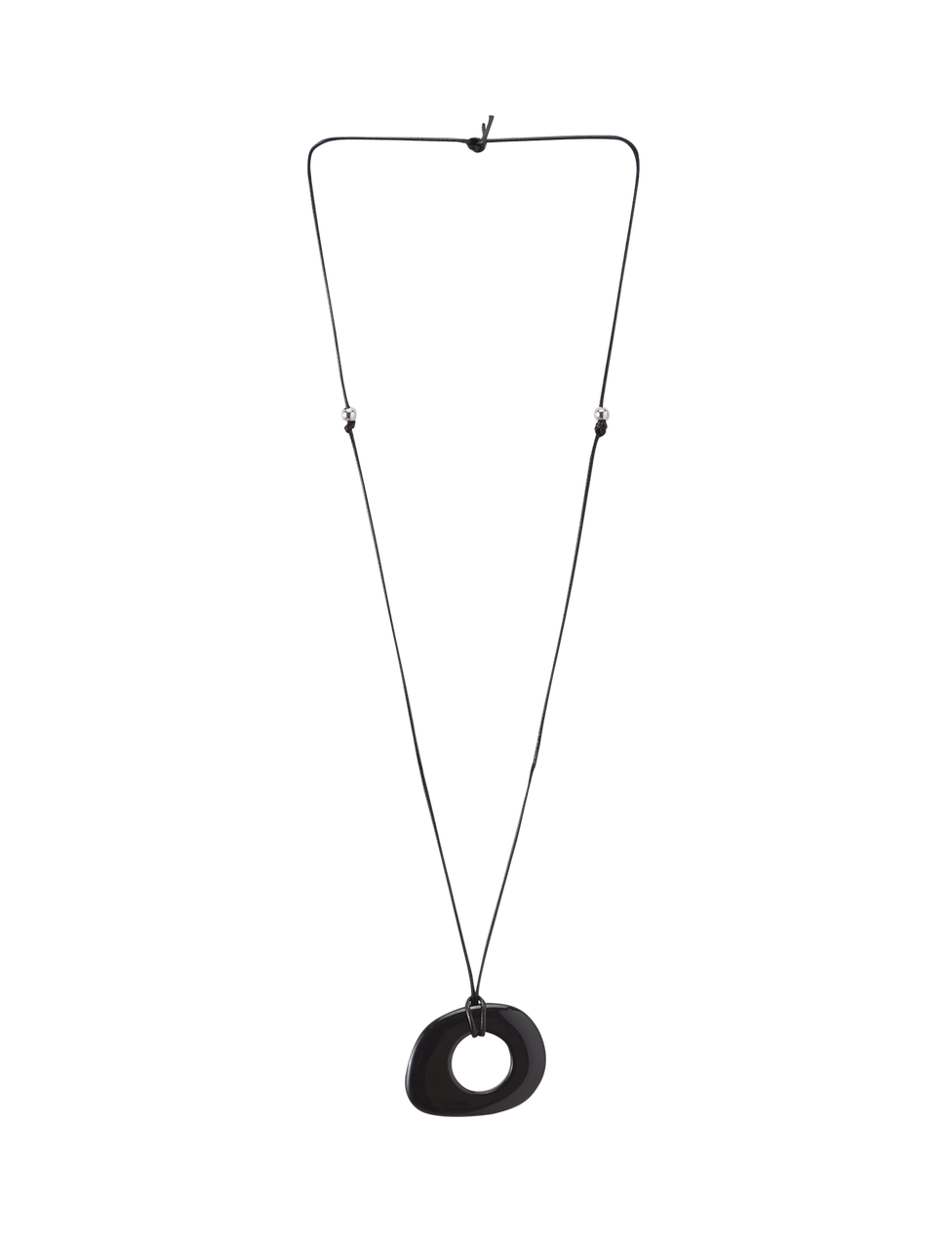 The FAELLA PENDANT NECKLACE - BLACK by TIGERMIST features a minimalist black cord with adjustable length and an abstract, asymmetrical black resin pendant at the center, shown on a white background.