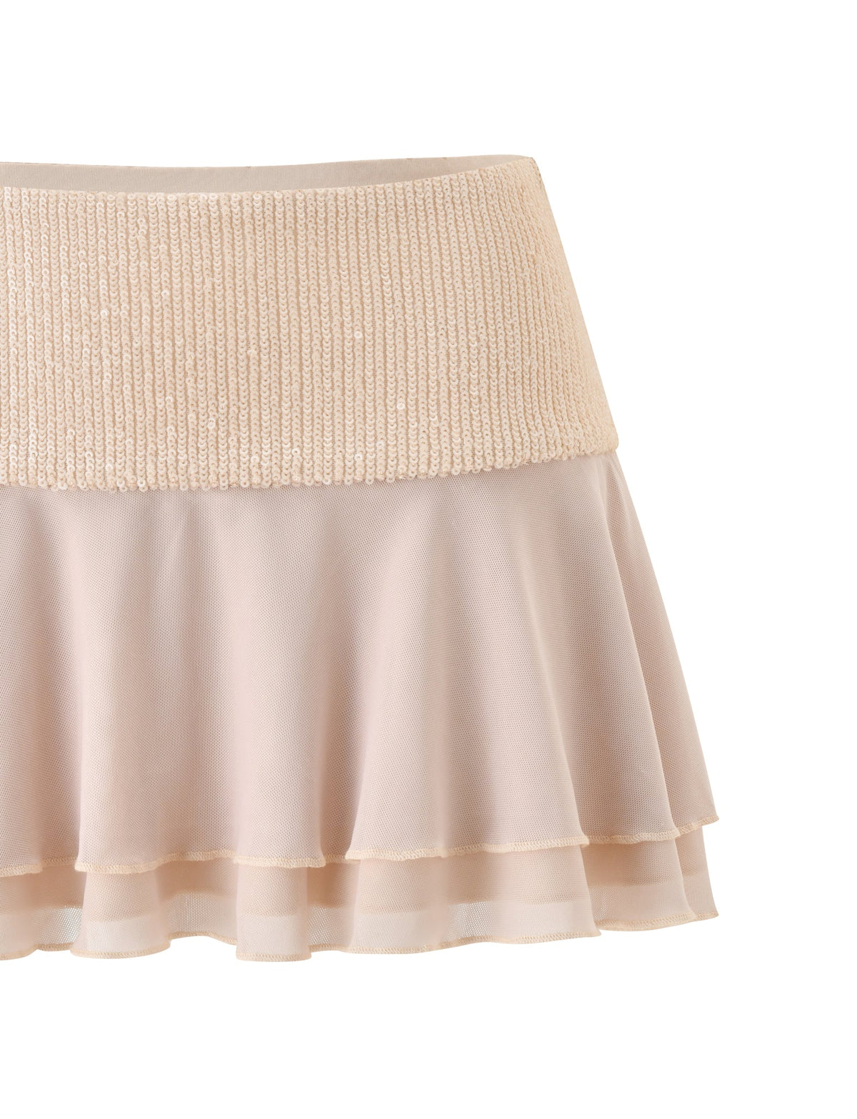 The SYLA MINI SKIRT - OAT by TIGERMIST features a ribbed elastic waistband and a layered, flowy chiffon design with a delicate tiered flounce, showcased against a white background.