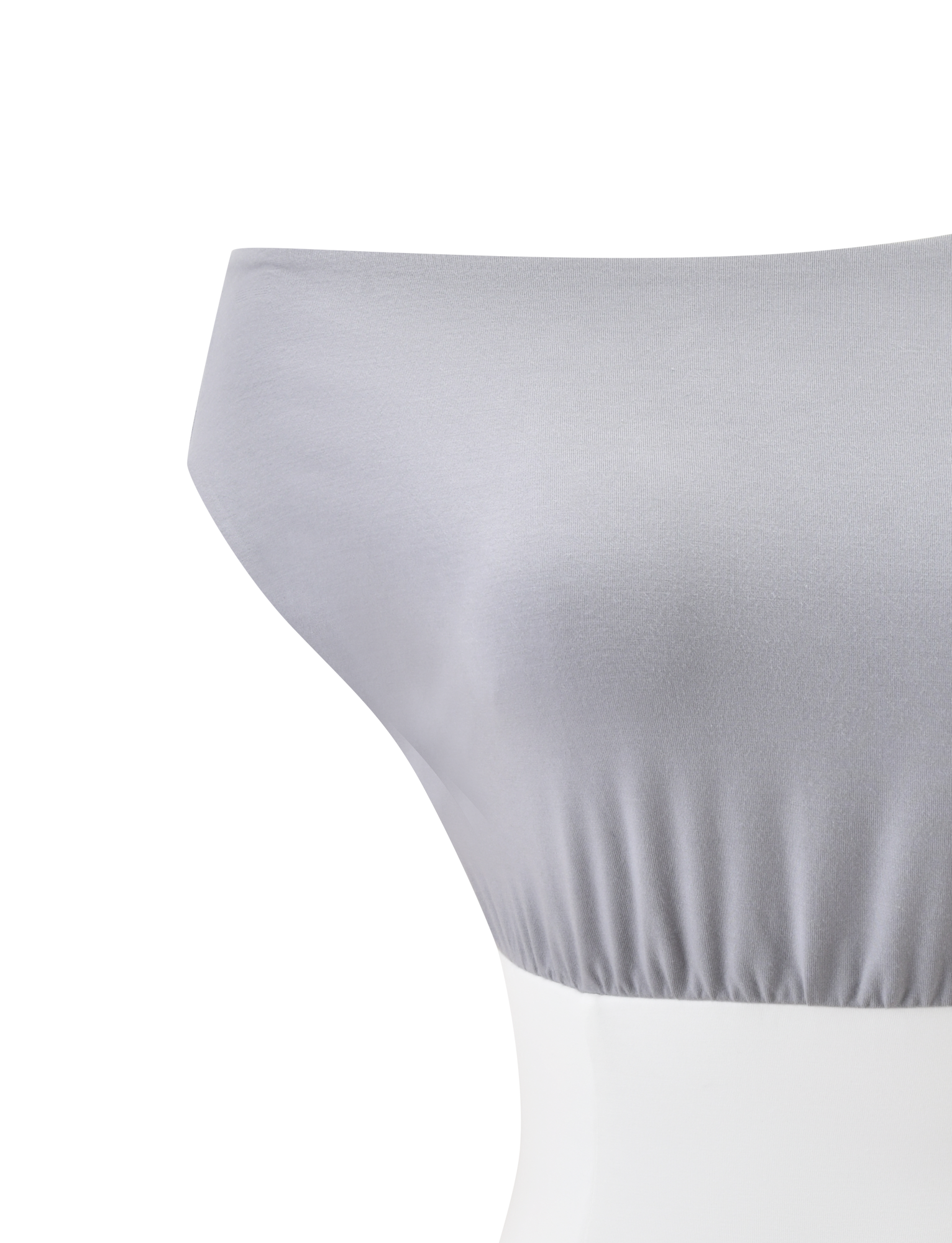 The ALYSSA OFF SHOULDER TOP - GREY by TIGERMIST features a smooth light gray finish, subtle hem ruching, and hints of a corseted waist, showcased on a white mannequin against a plain white background.