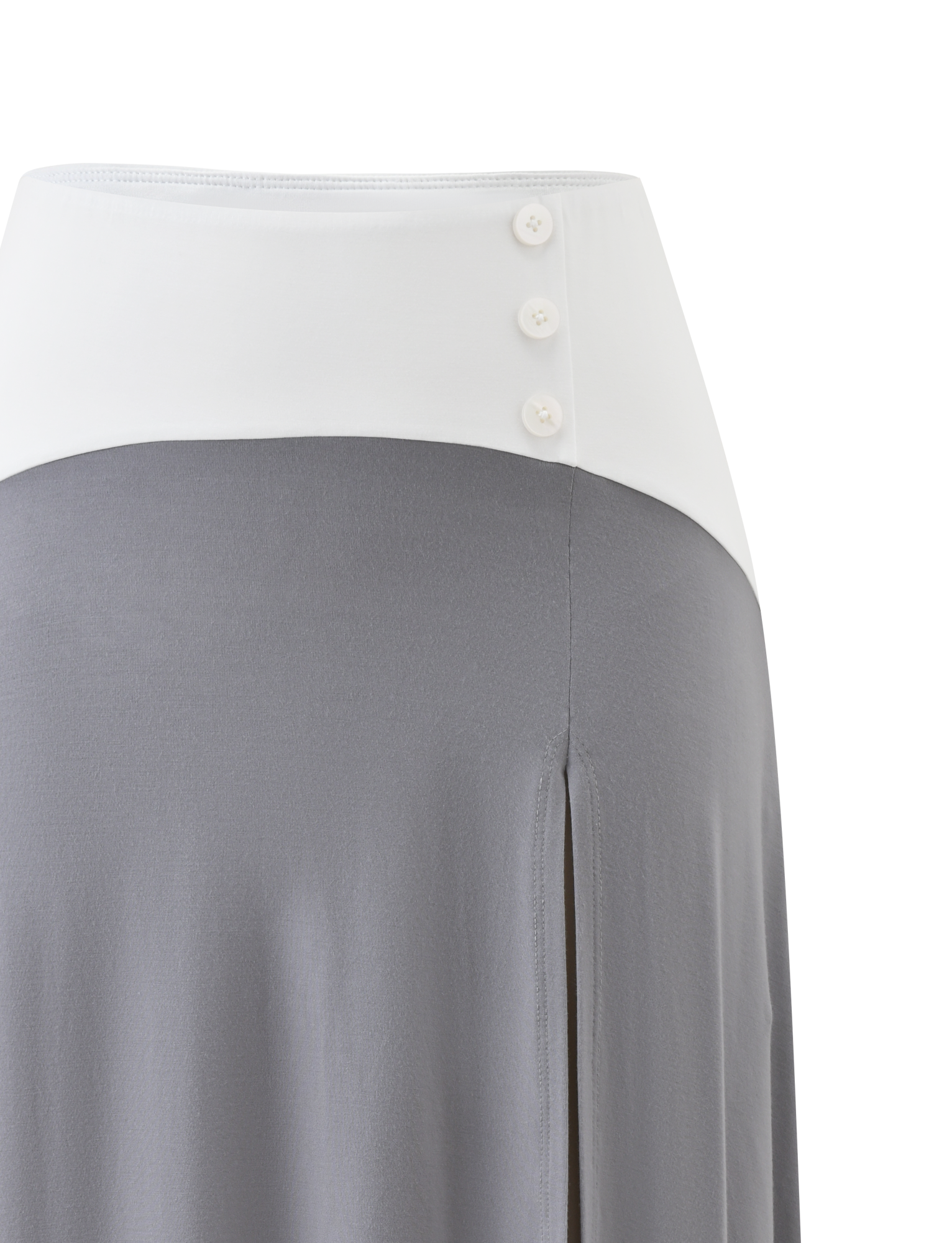 The ALYSSA HI LO SKIRT by TIGERMIST features a high waist, wide white waistband with three buttons, flowing grey fabric, asymmetrical hem, and a chic front leg slit.