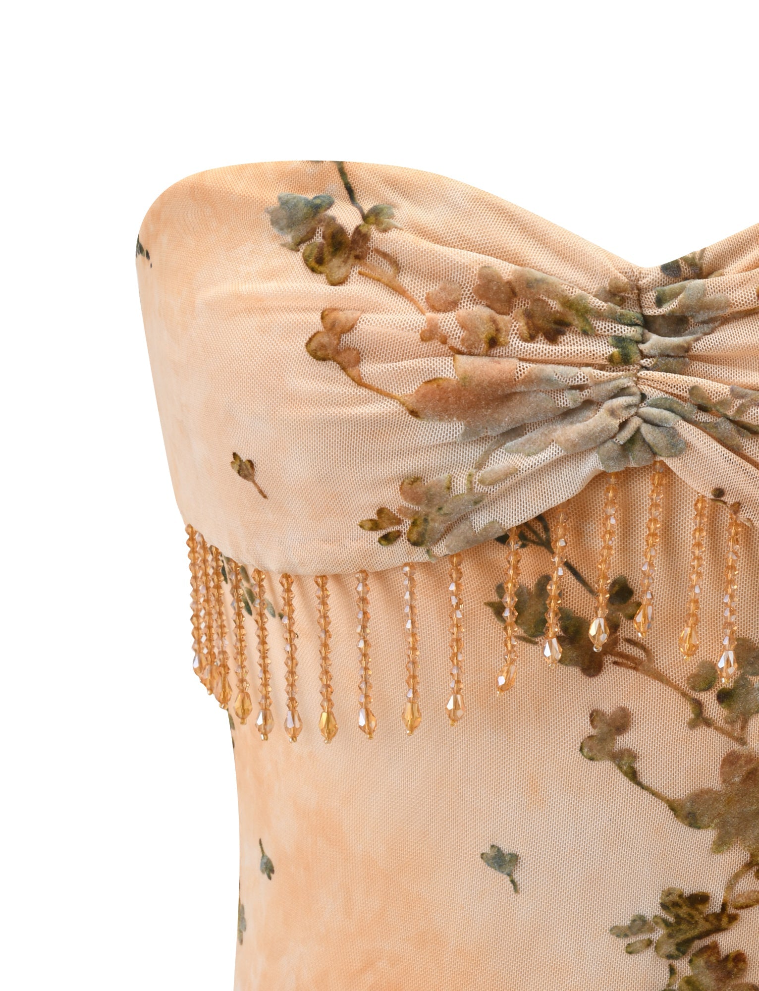 Close-up of the TIGERMIST OONA BURN OUT FRINGE TOP in tan, a strapless floral top with peach and green accents, gathered sweetheart neckline, and delicate beaded fringe trim below the bust.