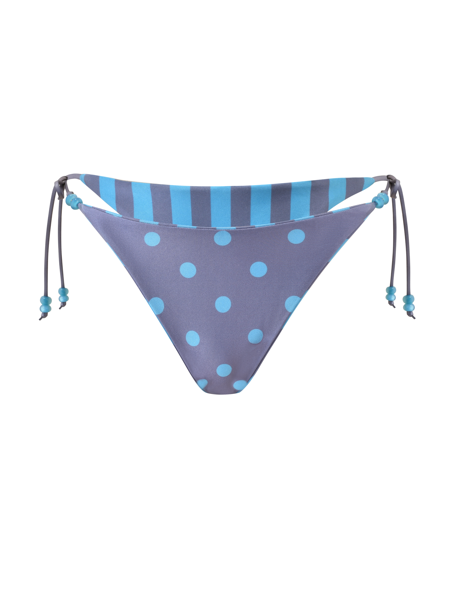 The FINLEA REVERSIBLE BIKINI BOTTOM by TIGERMIST features a blue-grey cheeky cut with light blue polka dots, a striped waistband, beaded side ties, and a white background.