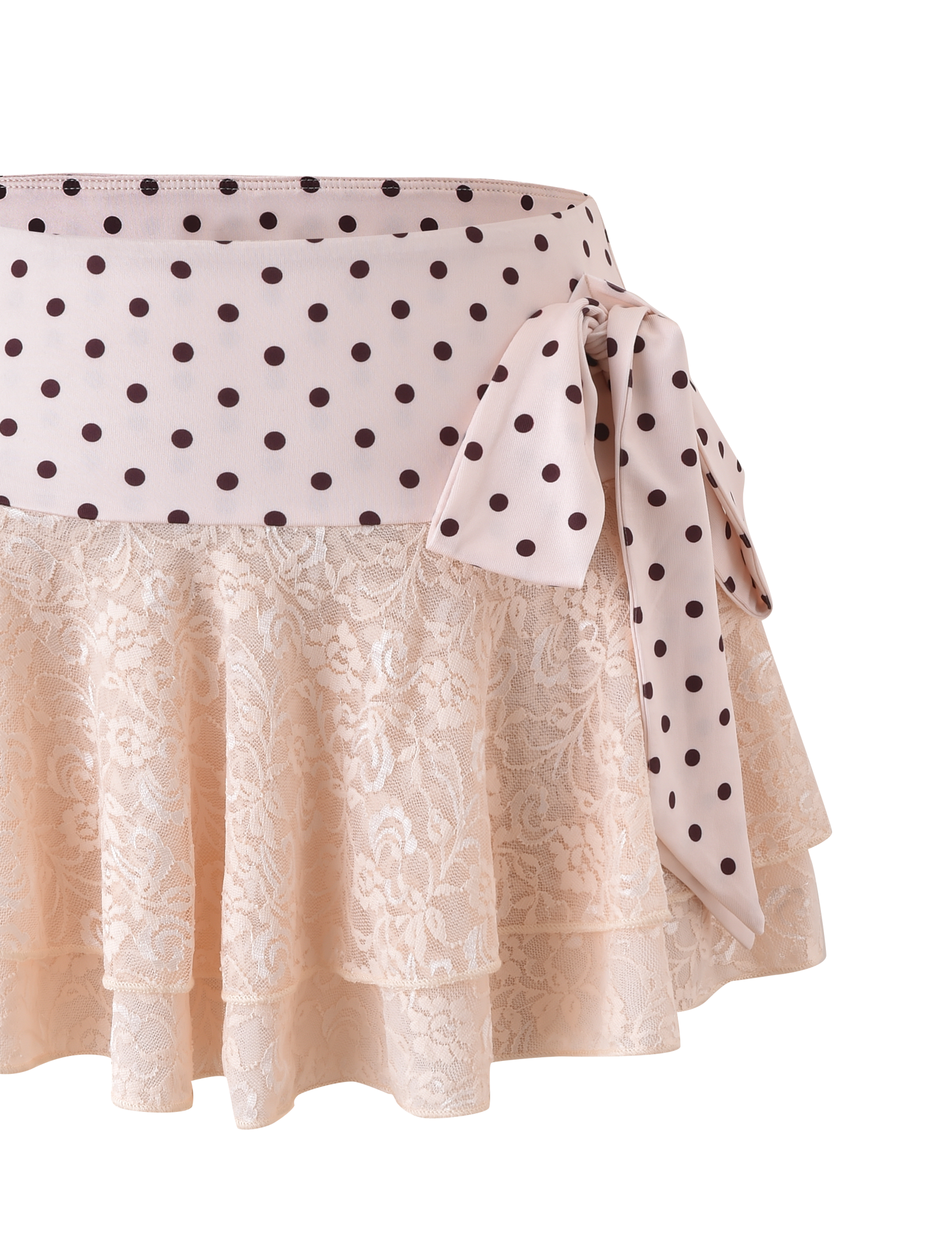 The KAYLI MINI SKIRT by TIGERMIST is a cream lace skirt featuring tiered ruffles and a wide matching sash belt with dark polka dots, tied in a side bow.