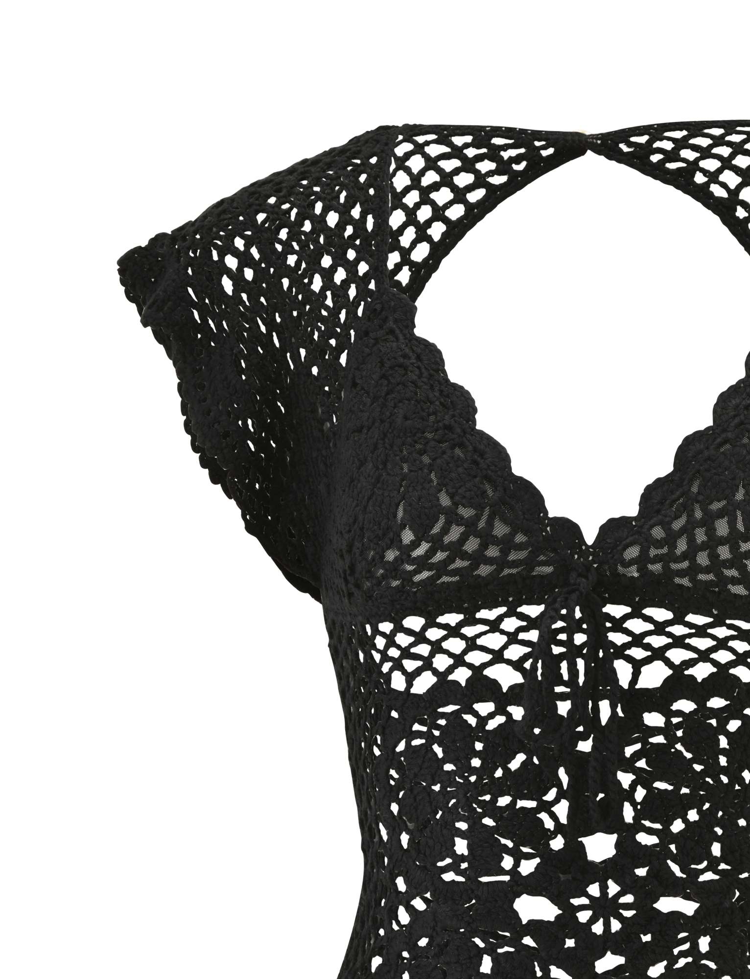 Close-up of the SASHA CROCHET TOP in black by TIGERMIST, featuring scalloped edges, a tie-front, and an open-knit pattern with floral and geometric designs—ideal for resort styling.