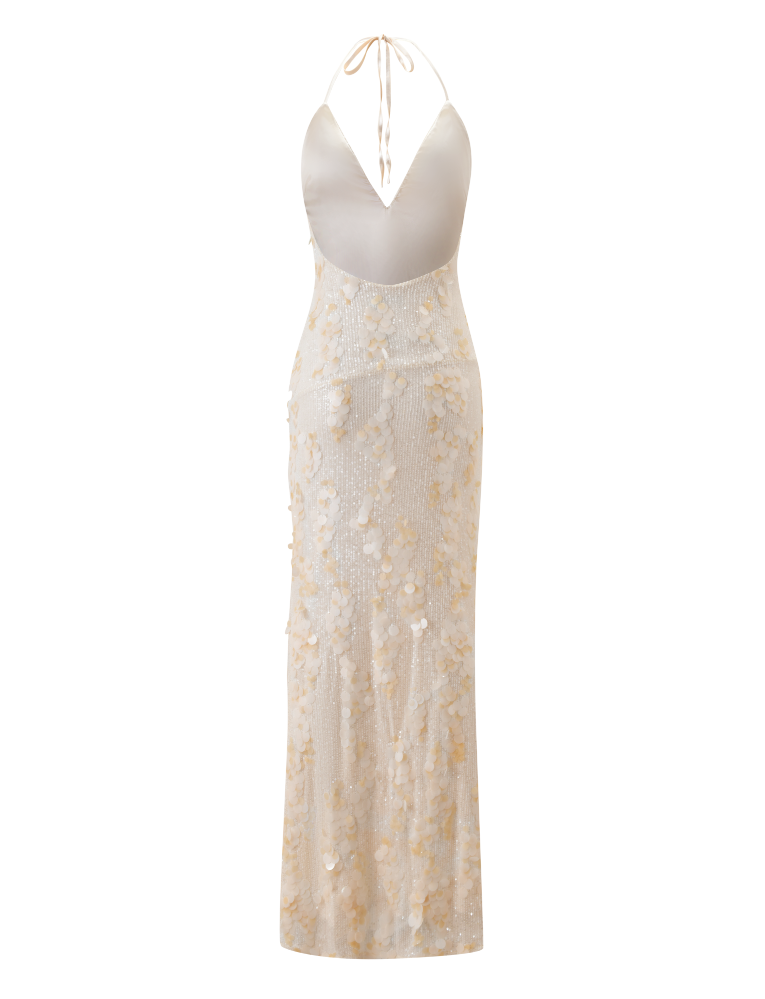 The ZANA MAXI DRESS - PEARL by TIGERMIST is a sleeveless, backless cream sequin dress featuring a plunging V-neckline, halter tie straps, and a sheer floor-length skirt with delicate sequin and floral embellishments.