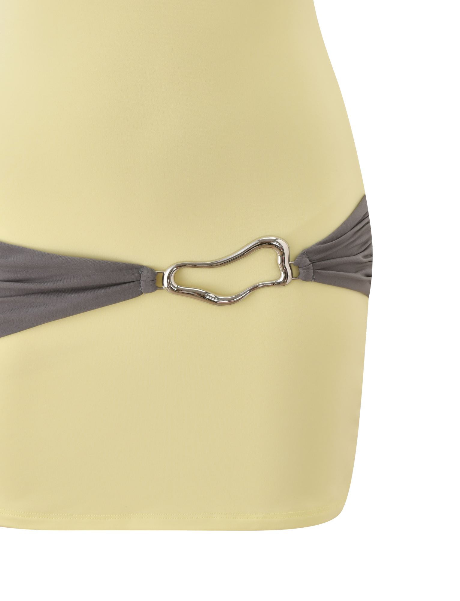 A close-up of the TIGERMIST EOS MINI DRESS in butter yellow and grey, showcasing a gathered waist with a grey band and a silver abstract-shaped metallic buckle.