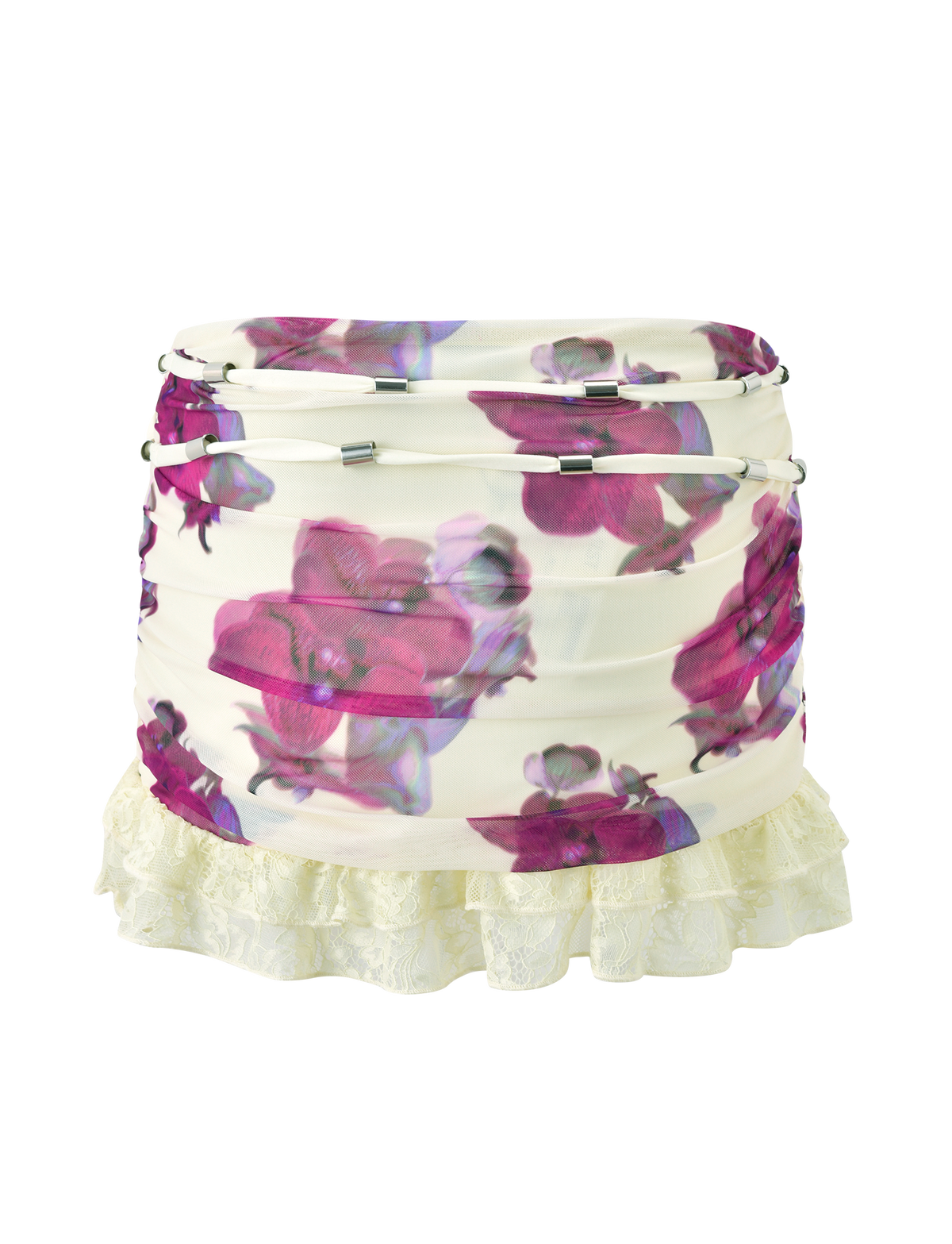 The TIGERMIST LILIAH MINI SKIRT - ORCHID HAZE is a white ruched mini with a bold orchid print, metallic details, and a cream lace ruffle hem for added charm.