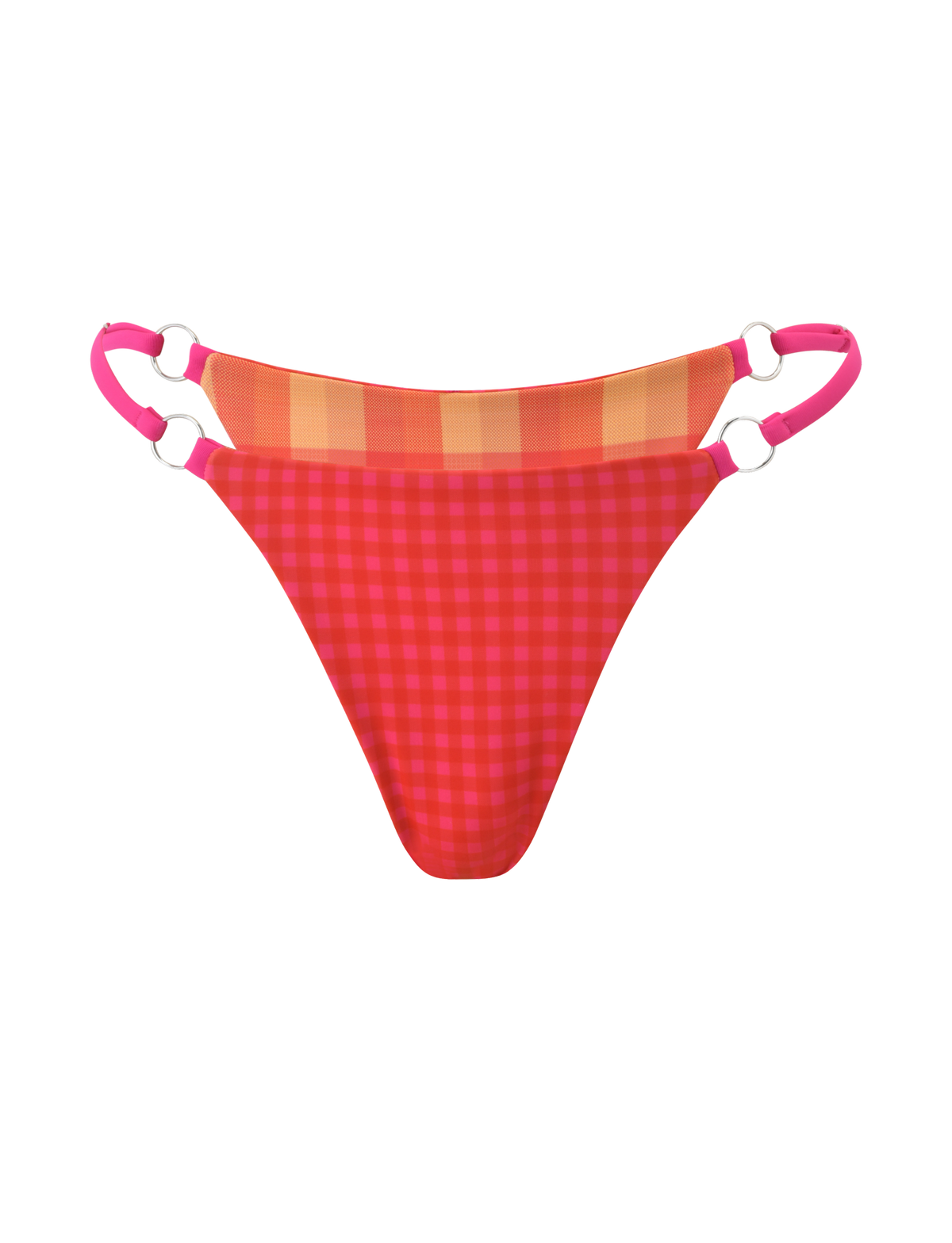 The AYANNA REVERSIBLE BIKINI BOTTOM by TIGERMIST features a red and pink gingham plaid pattern, orange and beige checkered straps, pink side bands with silver rings, and cheeky coverage. Shown against a white background.