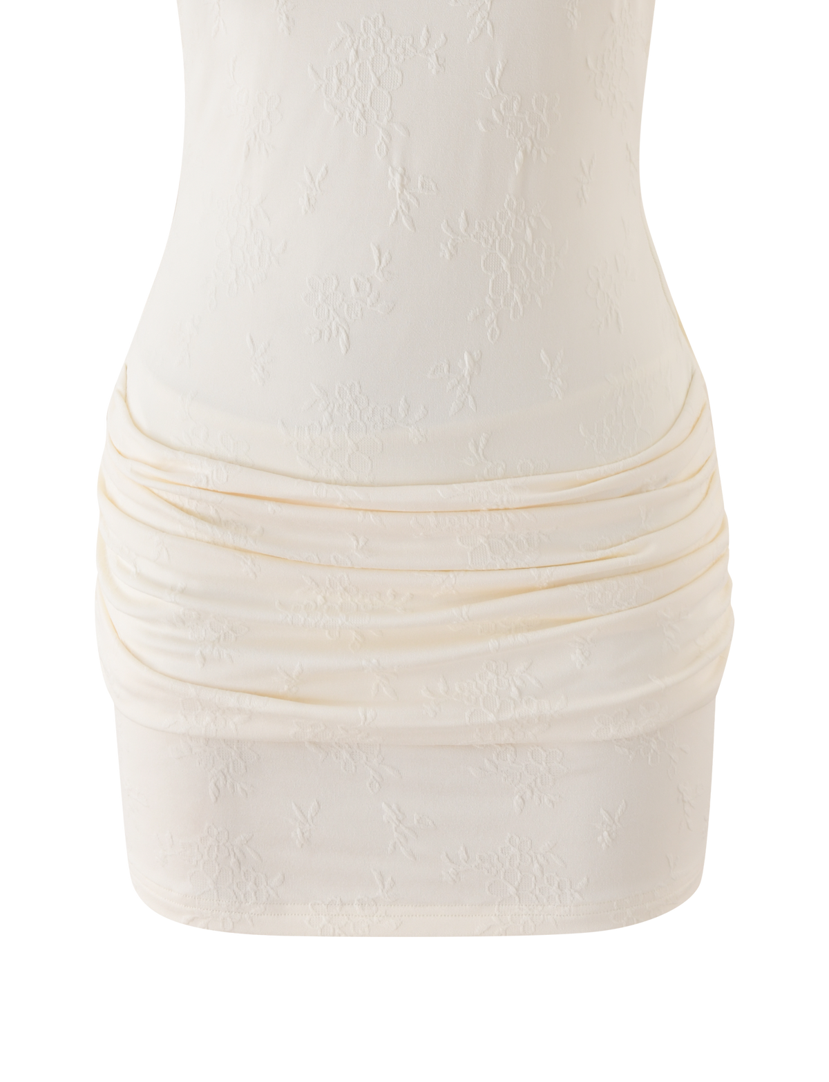 Close-up of the CAITLIN MINI DRESS in cream by TIGERMIST, a fitted knit mini dress featuring subtle floral embroidery and ruched detailing at the hips.