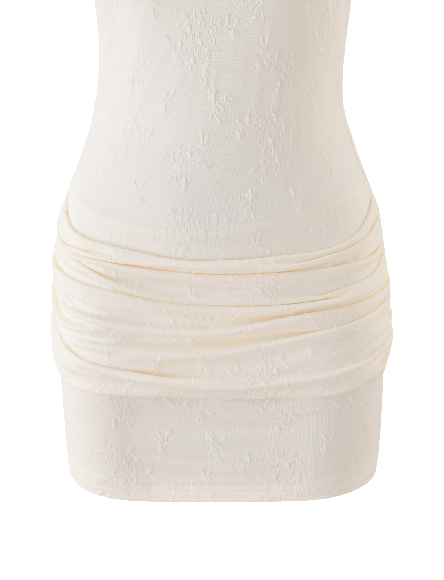 Close-up of the CAITLIN MINI DRESS in cream by TIGERMIST, a fitted knit mini dress featuring subtle floral embroidery and ruched detailing at the hips.