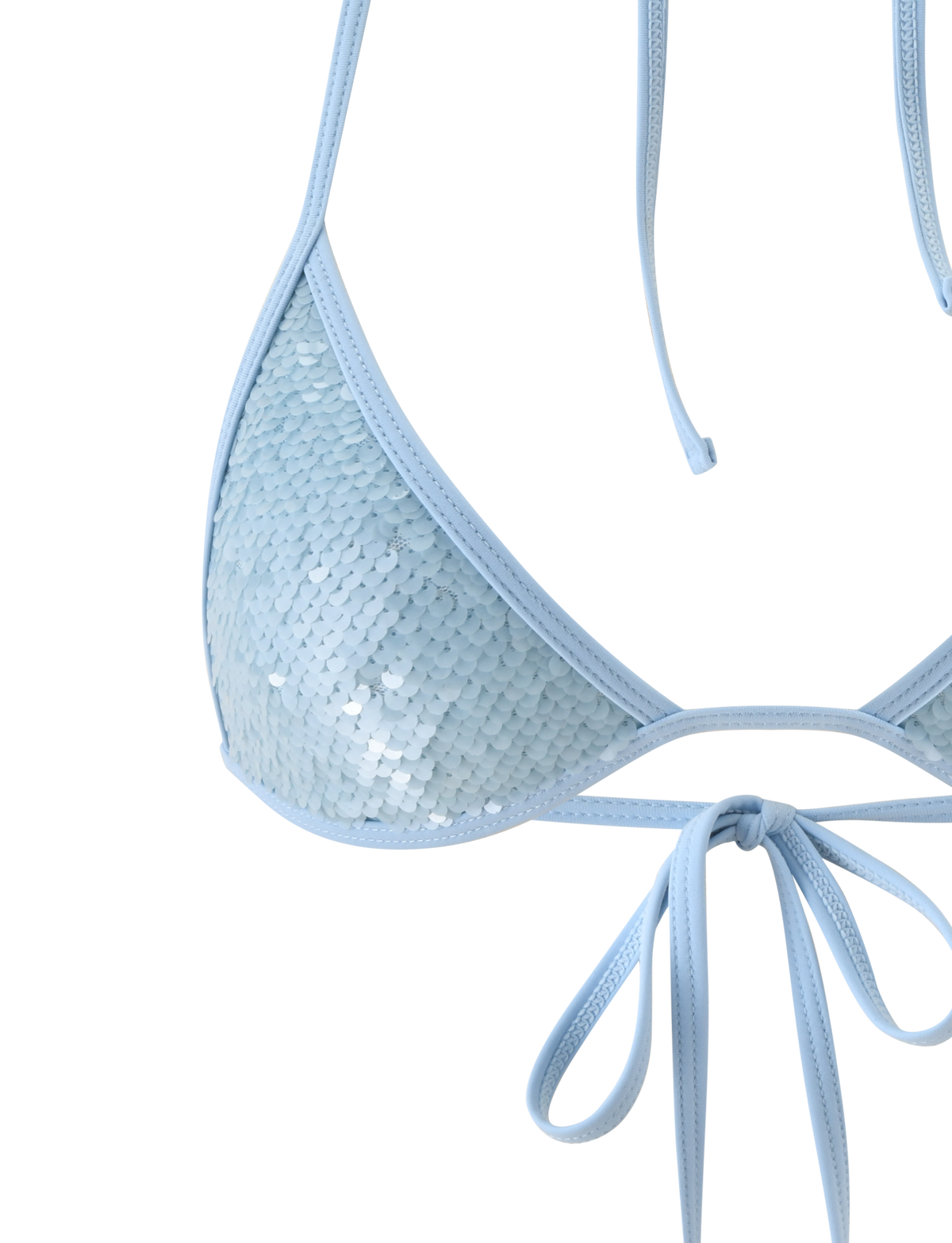Close-up of the SOLAS SEQUIN BIKINI TOP - SKY BLUE by TIGERMIST, featuring shiny sequins, thin straps tied in a bow at the front, and a halter neck—ideal beach club swimwear against a plain white backdrop.