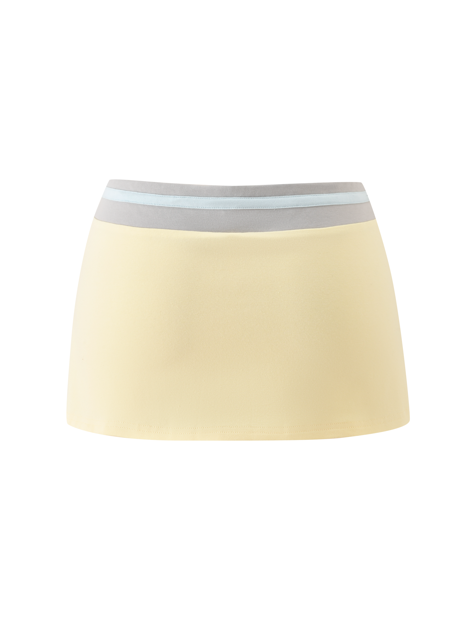 The TIGERMIST COLLINS SKORT - BUTTER is a butter yellow skort with mini shorts, a thick grey waistband, and a horizontal light blue stripe, shown on a plain white background.