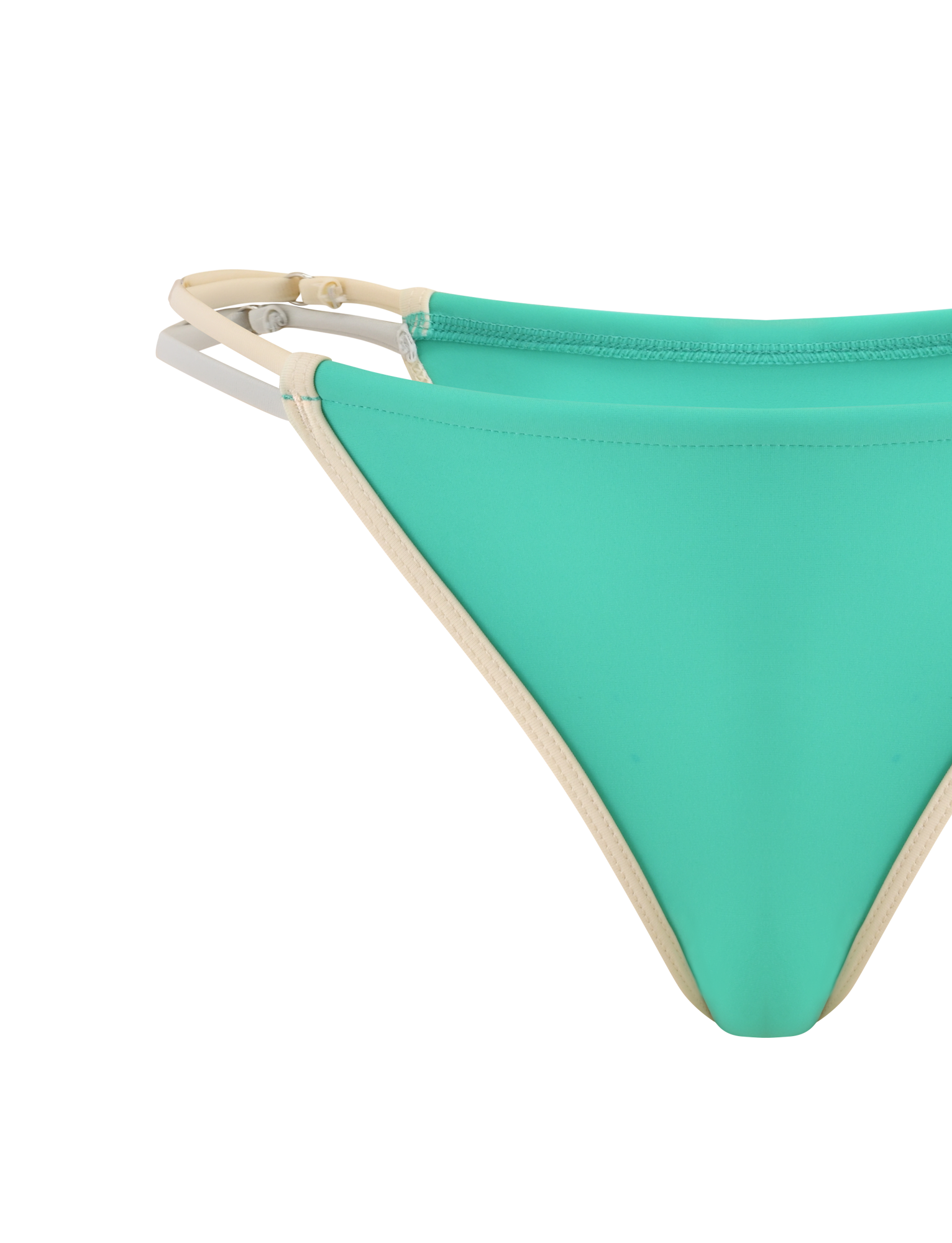 A close-up of the TIGERMIST JACE BIKINI BOTTOM in Kelly Green, featuring beige trim and adjustable straps, displayed against a white background.