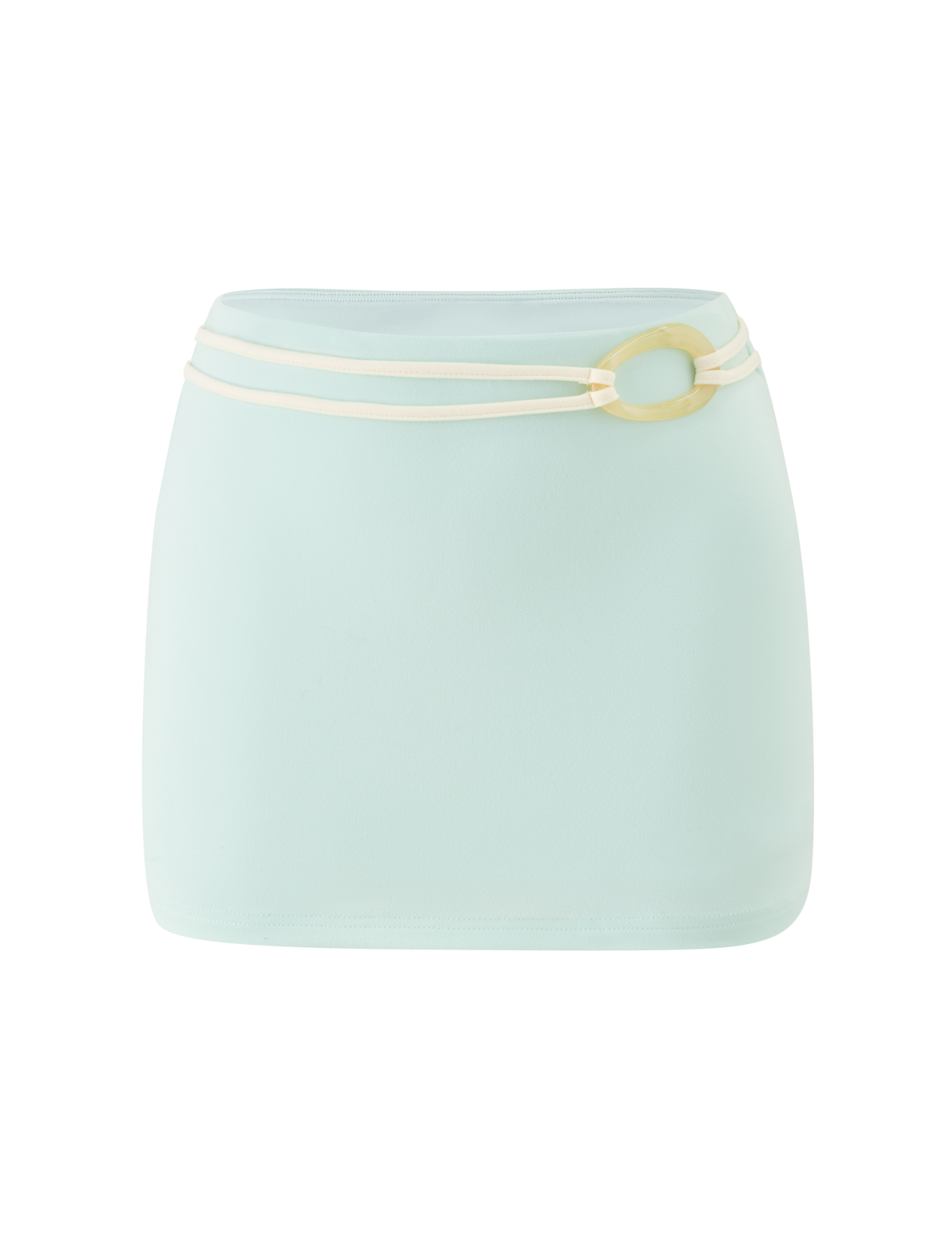 The TIGERMIST GREER MINI SKIRT in mint green is a high-waisted, pull-on mini skirt with a smooth, simple design and a thin cream belt featuring a large oval buckle wrapped twice at the waist.