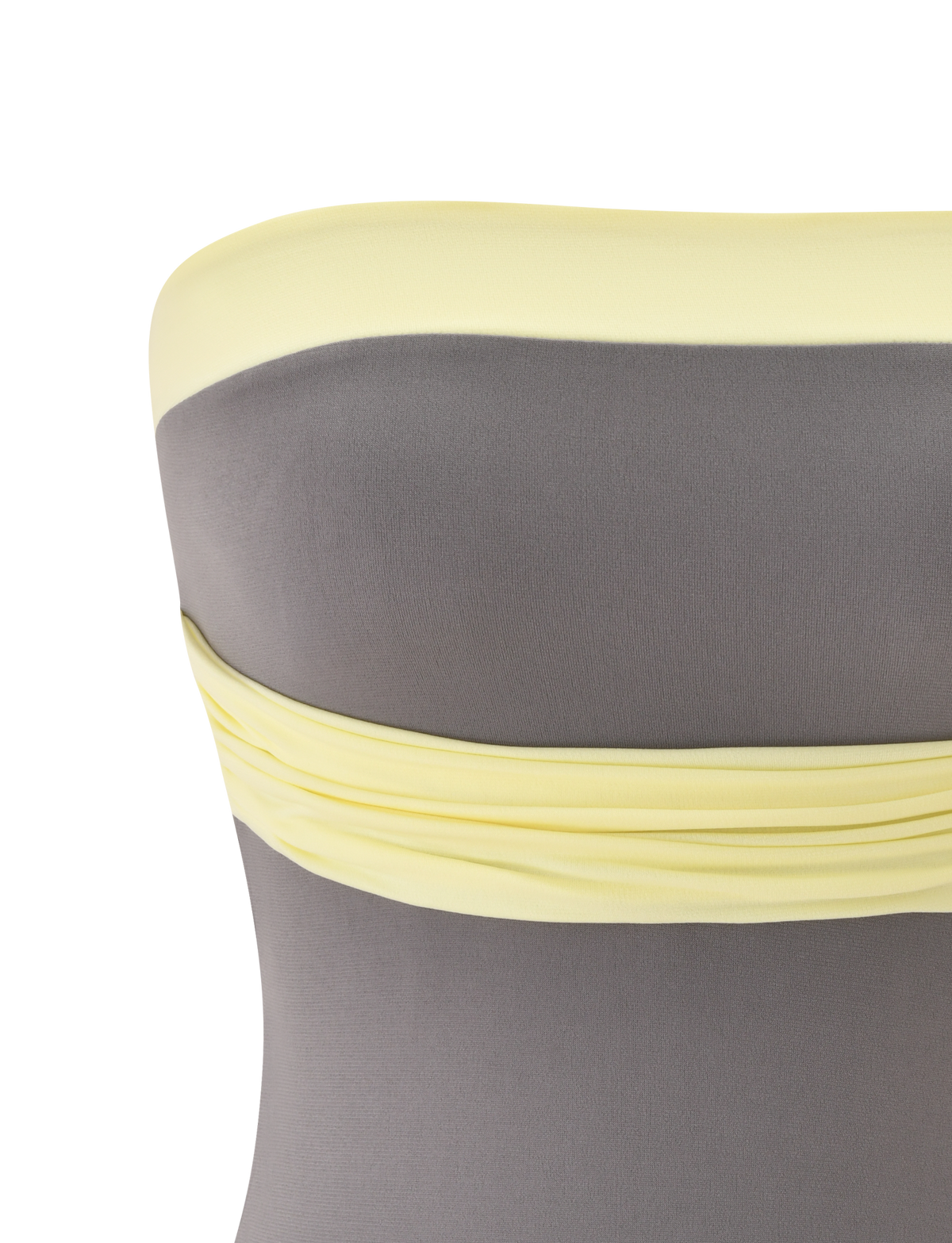 Close-up of the TIGERMIST EOS TOP - GREY AND YELLOW, a strapless boob tube featuring a gray bodice, light yellow trim at the top, and a yellow ruched band below the bust. The color-blocked design pops against a white background.