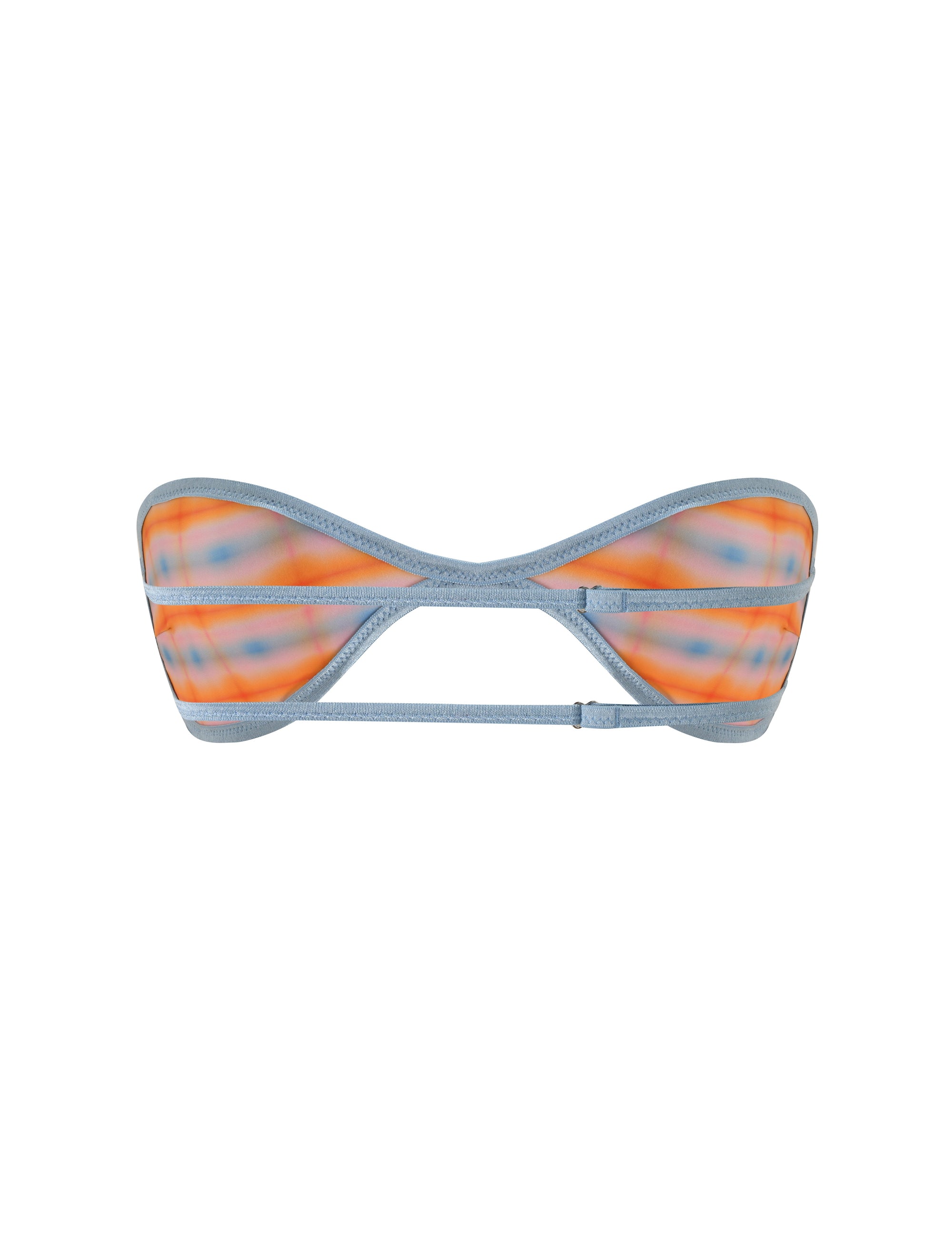 The TIGERMIST EMERSON REVERSIBLE BIKINI TOP features a strapless sweetheart bandeau design with blue edges and an orange and blue plaid ombre print. This top includes a custom reversible pattern, a center cutout, and double horizontal straps along the back.