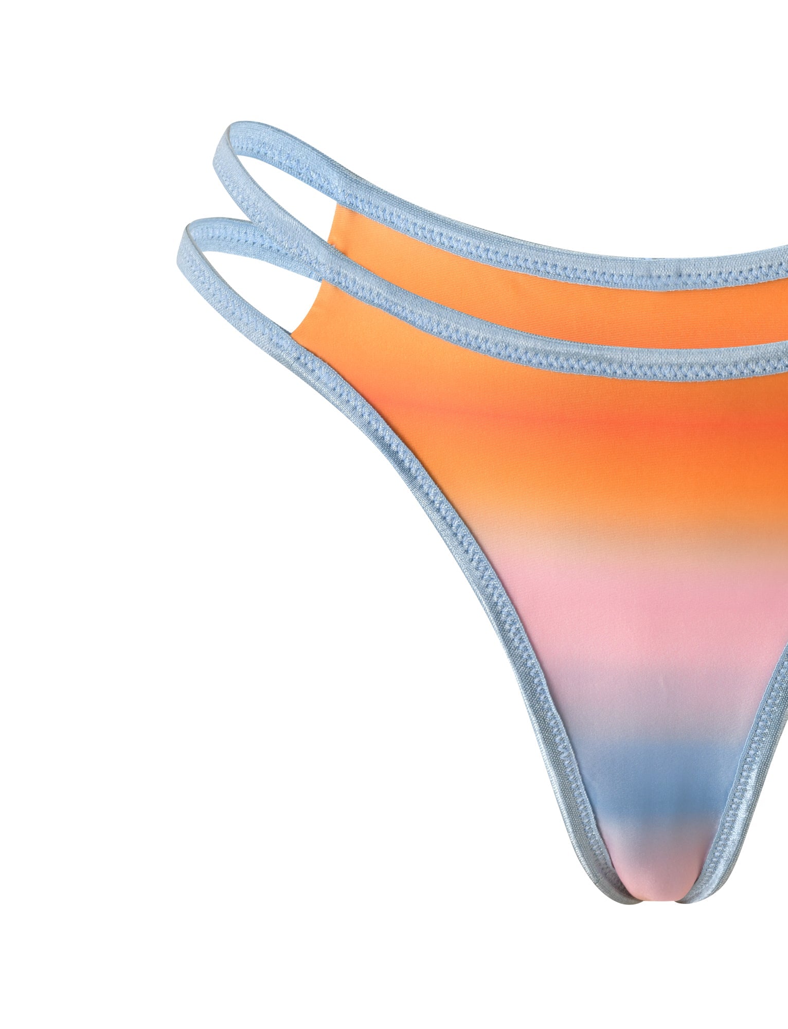 A close-up of the TIGERMIST EMERSON REVERSIBLE BIKINI BOTTOM in an orange and blue plaid ombre print. This cheeky fit style features double blue straps, delivering a playful yet comfortable look.