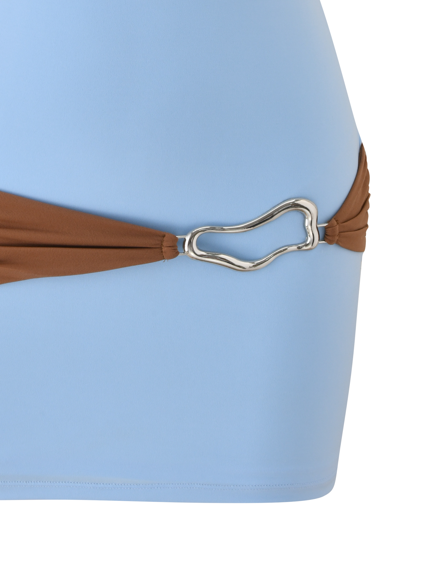 A close-up of the TIGERMIST EOS MINI DRESS in soft blue and mocha, featuring a brown hip strap with a silver, abstract-shaped metal buckle.