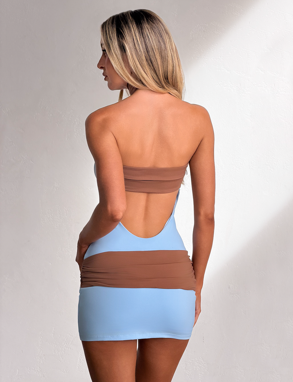 hottest mini dress Our hottest 'Casey Mini Dress in Black' Featuring crossover bust panels for a cut-out look, delicate halter straps, and a fitted mini skirt, this dress is made to turn heads.
