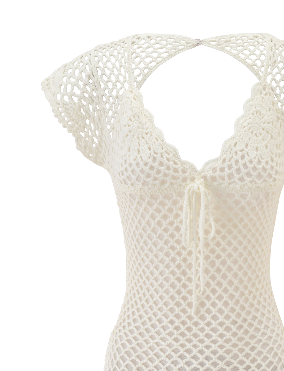 The SASHA CROCHET MINI DRESS by TIGERMIST features a cream-white crochet design with cap sleeves, a scalloped V-neckline, front tie, and open net-like pattern—perfect as a swim cover-up or for vacation wear.
