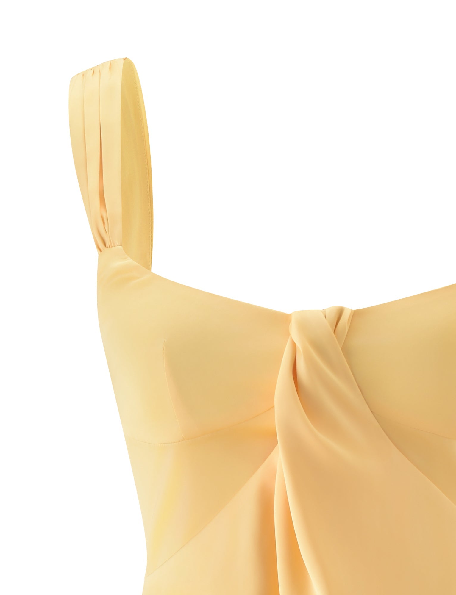 Close-up of the TIGERMIST STAV MINI DRESS in butter yellow, an A-line mini dress with a twisted knot detail at the front and wide shoulder straps, perfect for a garden party, set against a white background.