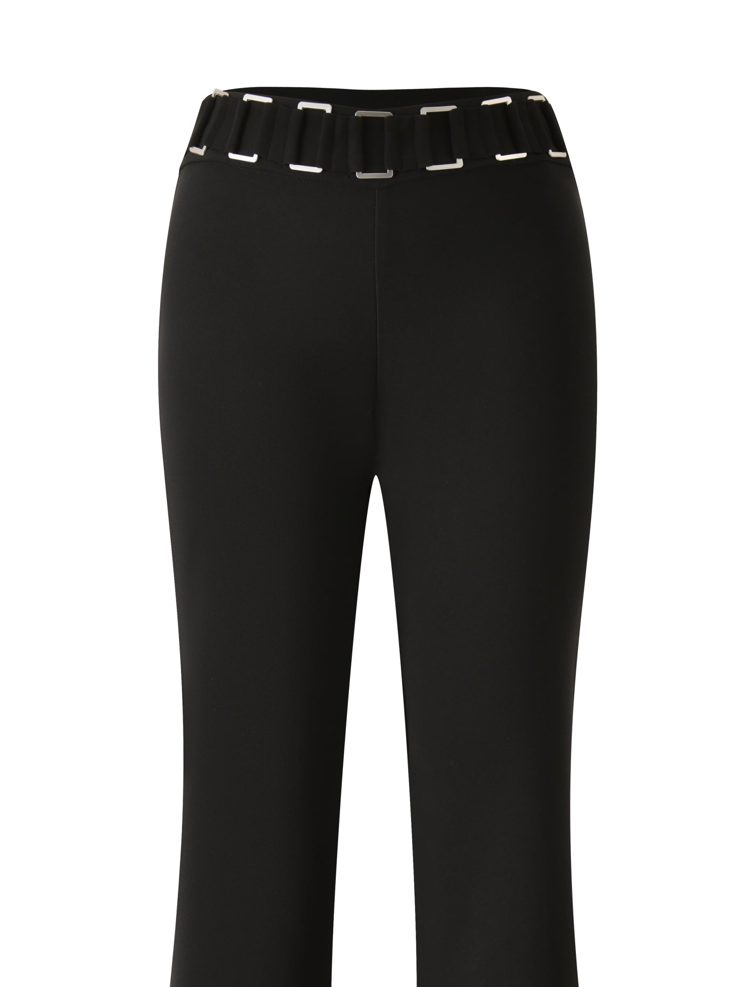Introducing the TIGERMIST JETTA PANT - BLACK: high-waisted black pants showcasing a sleek, flared silhouette with prominent belt loops adorned by large rectangular silver accents along the waistband. These pants feature a smooth, fitted design elevated by an eye-catching silver buckle detail at the waist.