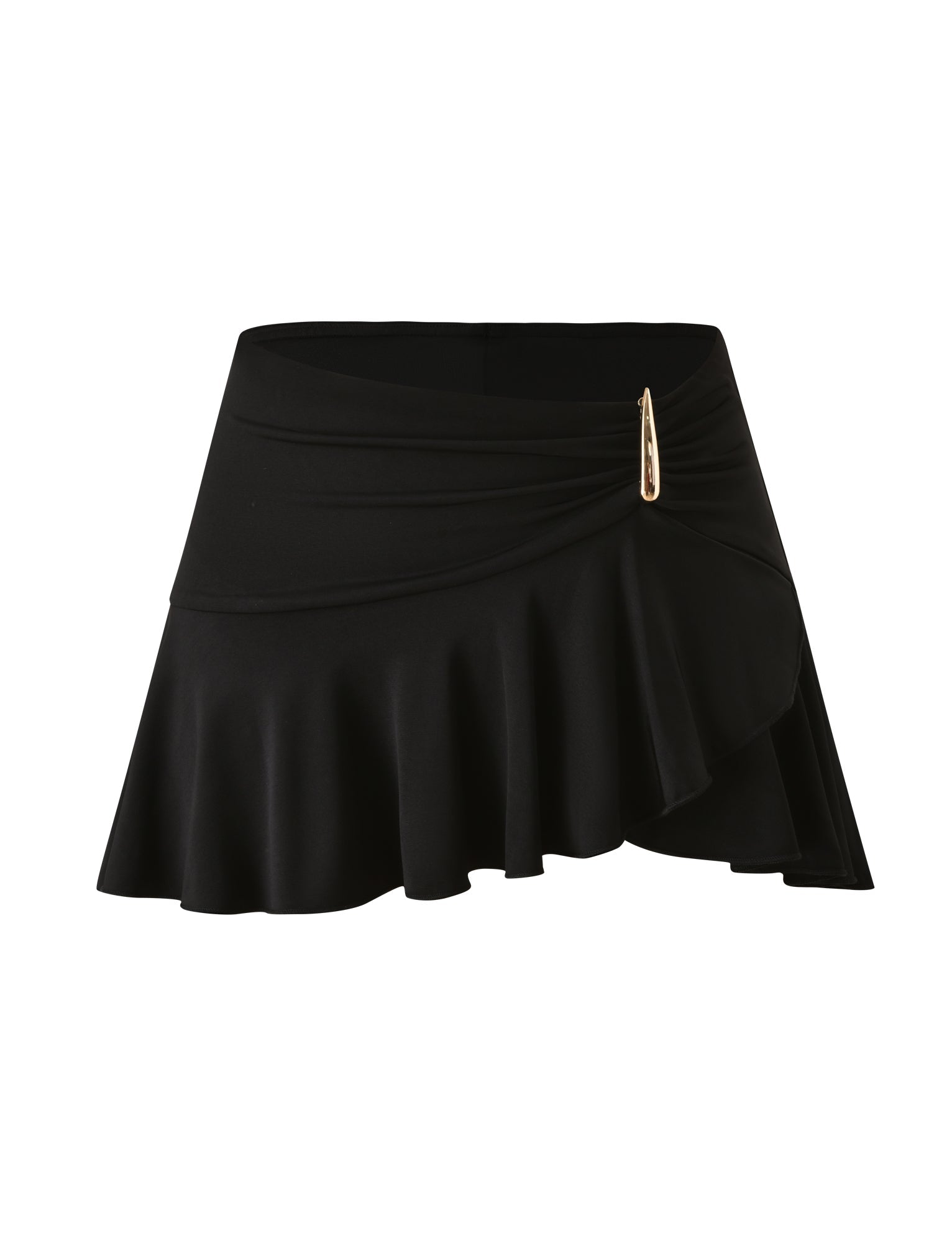 The SOLIA MINI SKIRT by TIGERMIST is a black mini skirt with a ruffled hem and draped detailing, finished with a gold triangular pin accent on the side.