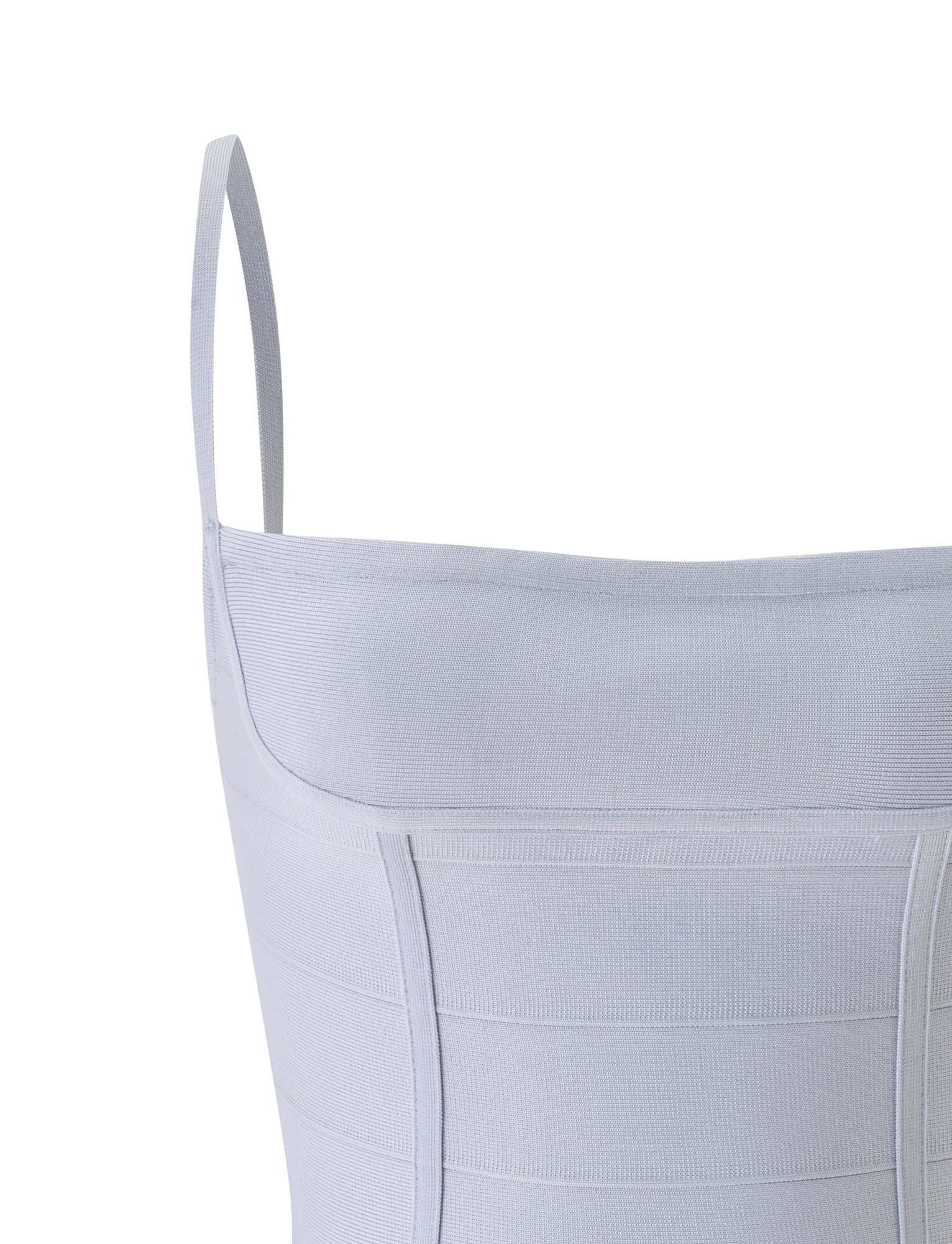 Close-up of the TIGERMIST TAHNIA BANDAGE TOP in dove grey, a sleeveless bandeau featuring thin shoulder straps and ribbed, panel-inspired stitching with a subtle corset effect, displayed against a white background.