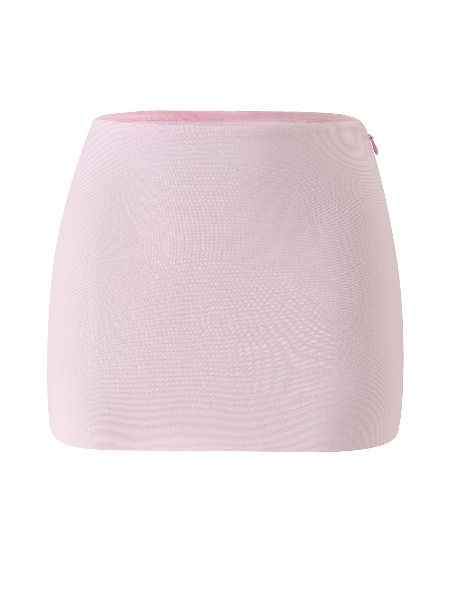 The TAHNIA BANDAGE MINI SKIRT in Ballet Pink by TIGERMIST is a high-waisted mini skirt crafted from sculpting bandage fabric, designed to gently hug your silhouette for a flattering fit. It features a smooth texture, a simple and clean design, and is finished with a small, subtle side zipper.