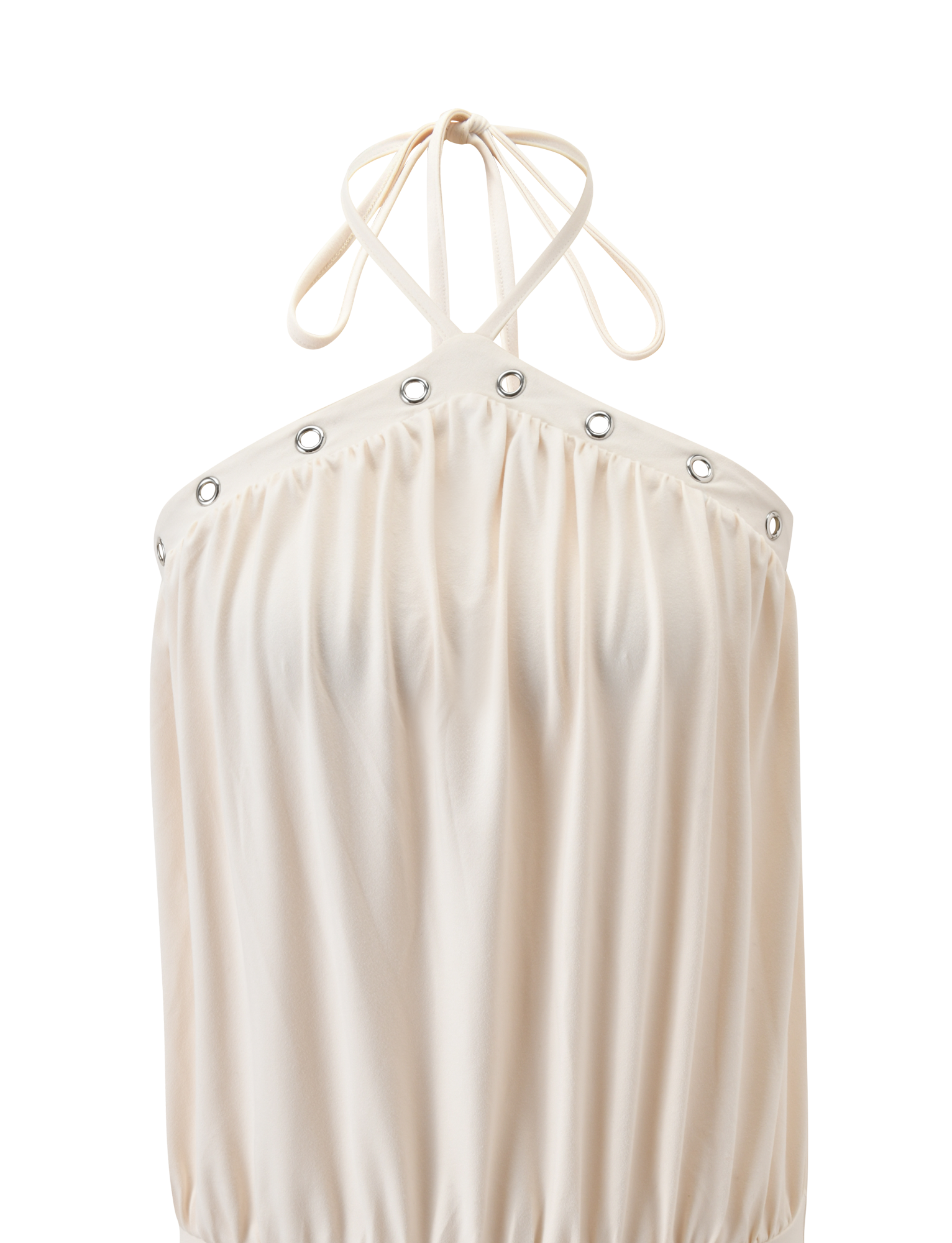 The NATASHA DRESS by TIGERMIST in cream features a halter neckline with thin cross-neck straps, silver grommet details, gathered loose fit, and soft flowing fabric.