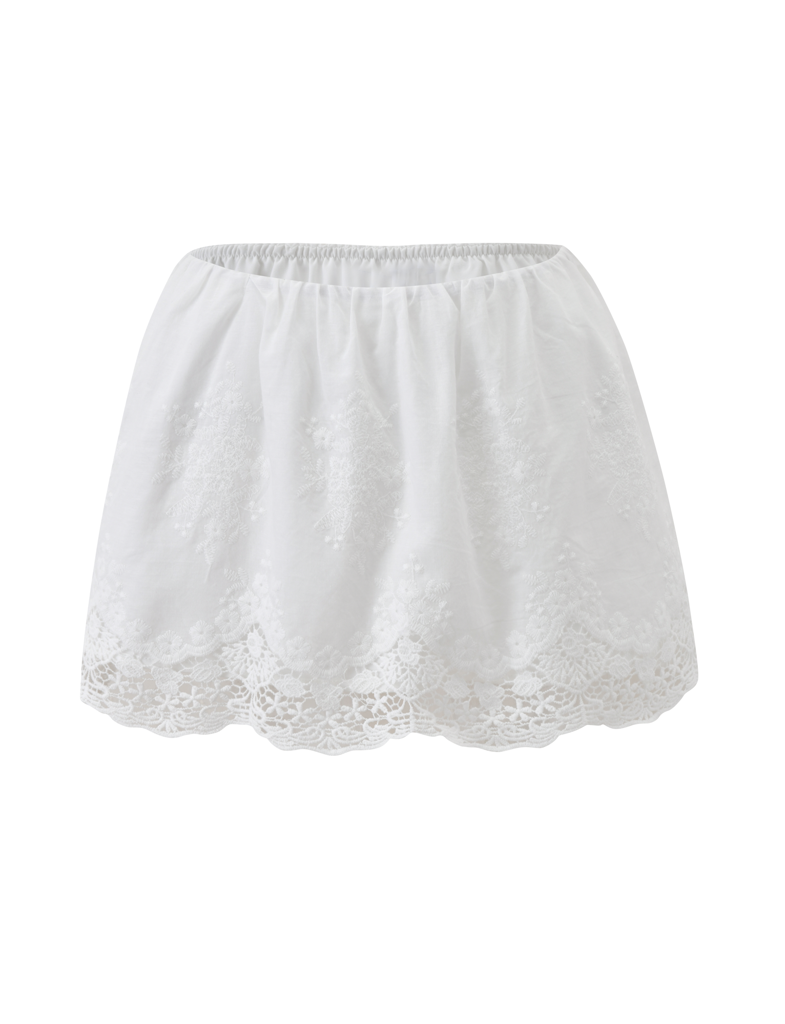 The CAILEIGH MINI SKIRT by TIGERMIST features a white A-line fit, elastic waistband, and floral lace along a scalloped hem. Its lightweight fabric creates an airy, feminine style ideal for warm days.
