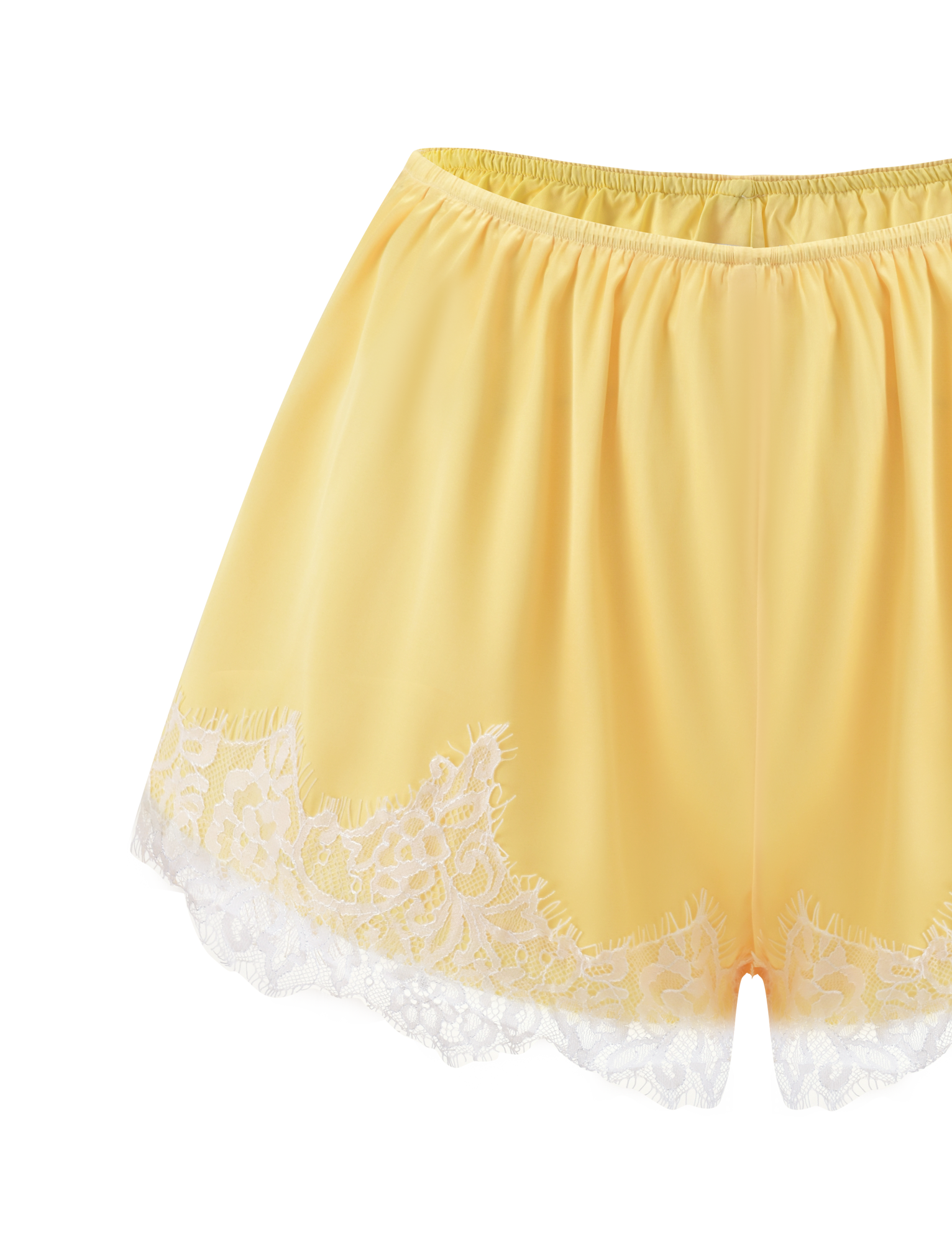 The TIGERMIST SOLSTICE SHORT-YELLOW is a satin mini short with an elastic waistband and floral white lace trim along the hem, offering a delicate, feminine look. Shown against a plain white background.