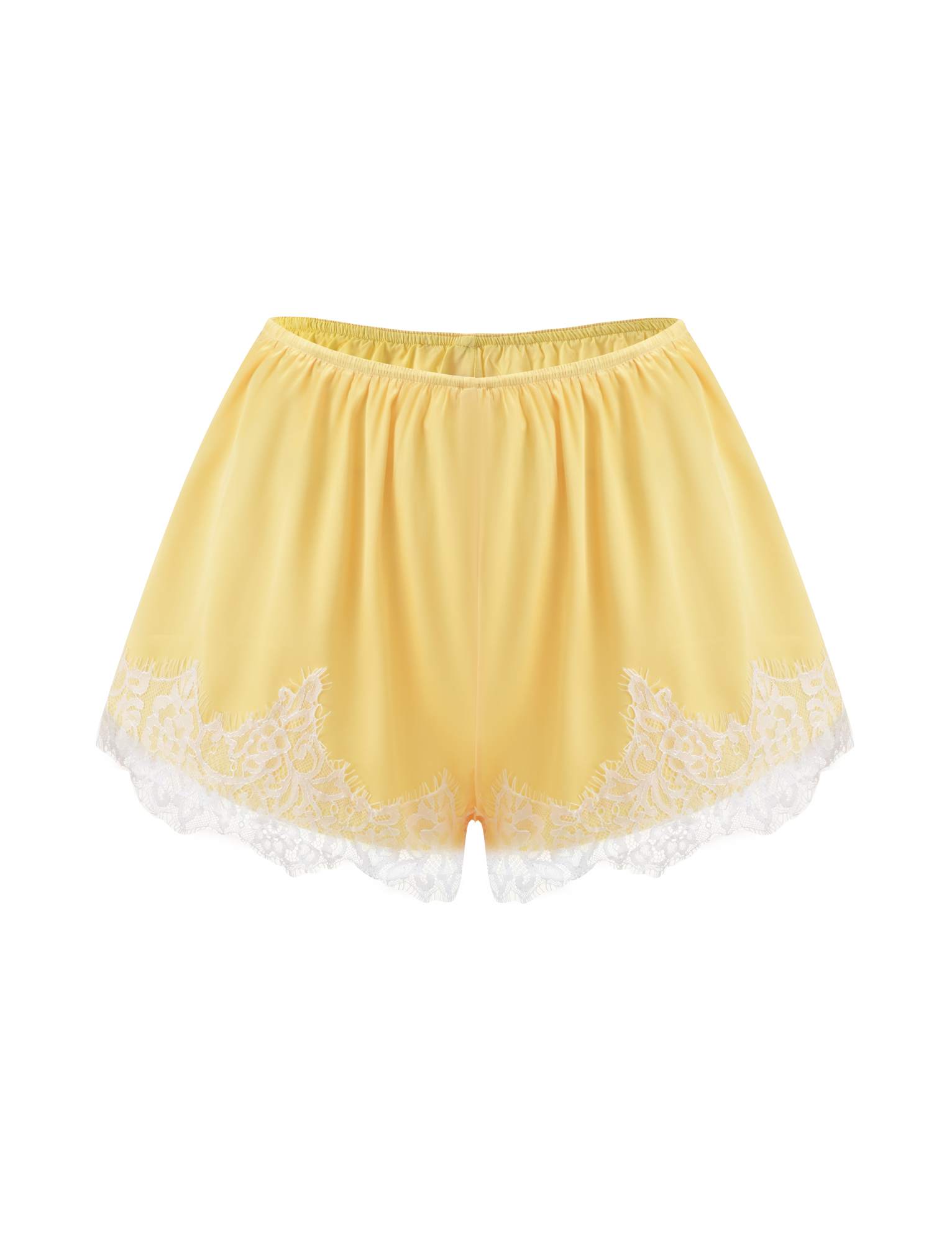 The SOLSTICE SHORT - YELLOW by TIGERMIST features yellow satin fabric with white lace trim at the hem, an elastic waistband, and a delicate, feminine design, shown against a white background.