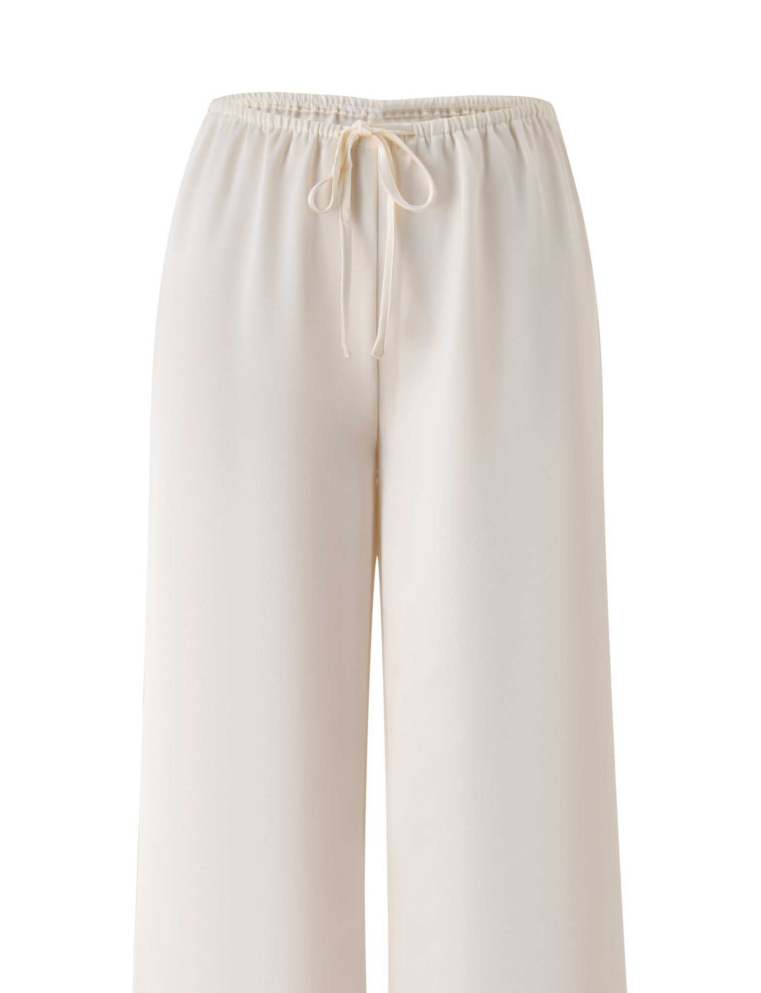 The MAURA PANT - WHITE by TIGERMIST showcases wide-leg cream pants made from drapey satin fabric, designed with an adjustable drawstring and elastic waistband, displayed against a plain white background.