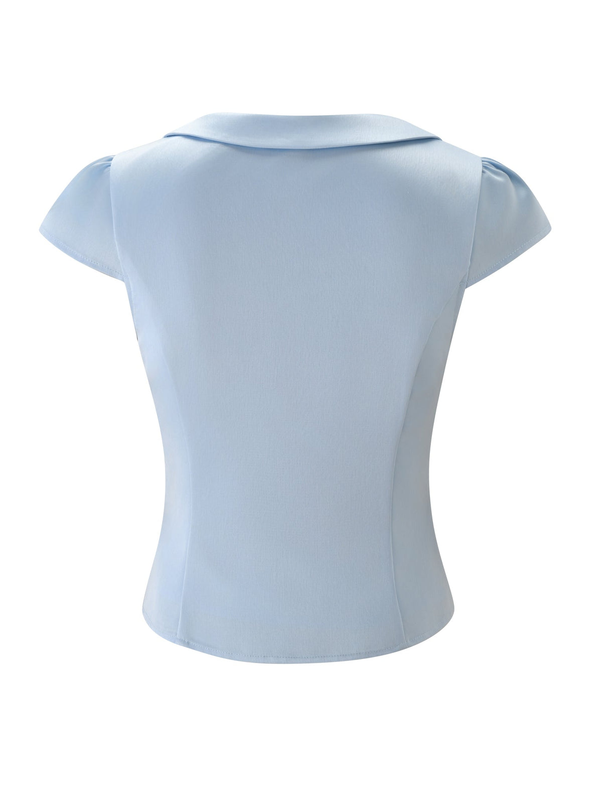The MAURA TOP - SKY by TIGERMIST is a light blue short-sleeve blouse with princess seams for a flattering fit and a small flat collar, shown from the back.