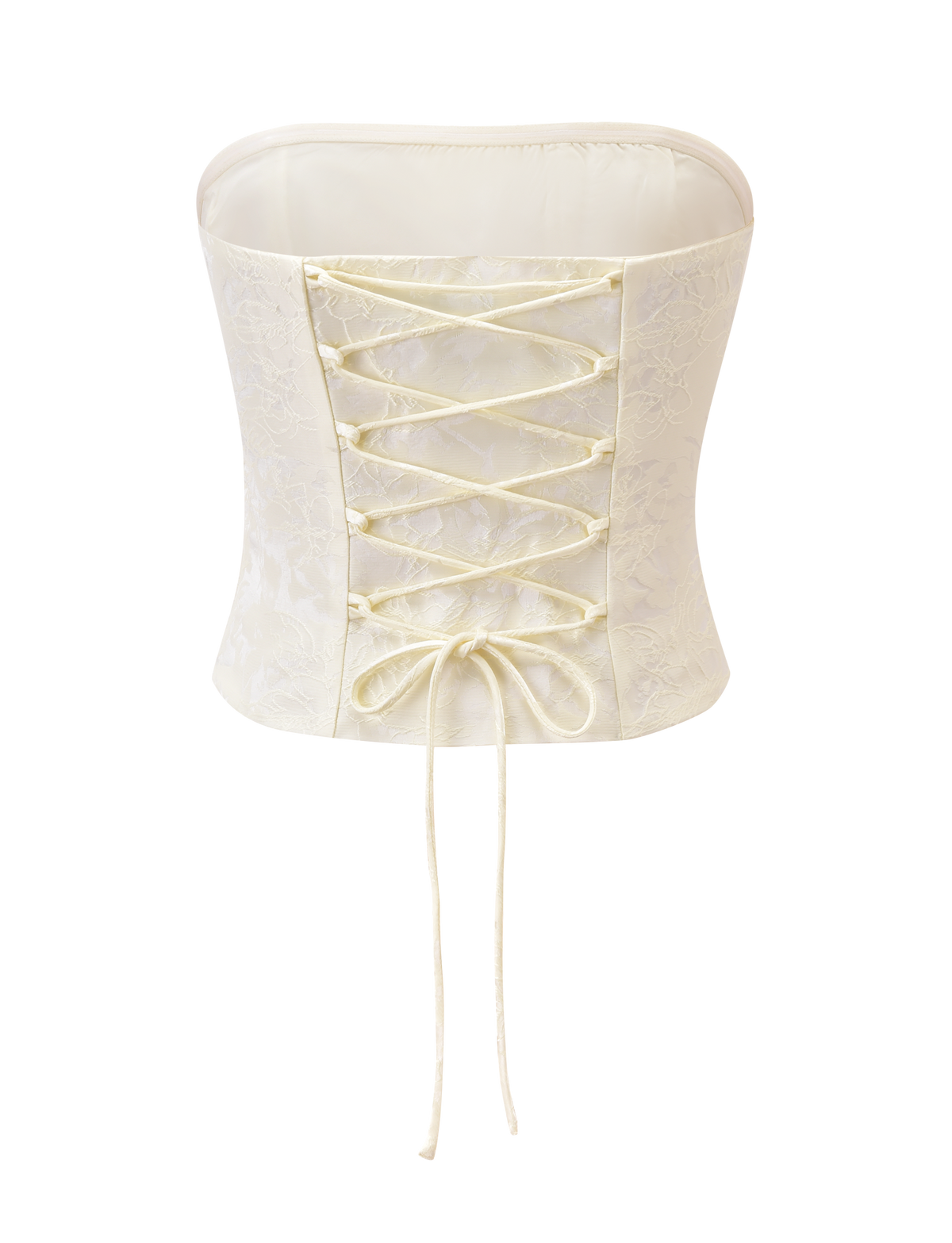 The LANIA CORSET TOP - CREAM by TIGERMIST features floral jacquard satin, a lace-up back, and tied bow detail, displayed on a plain white background.