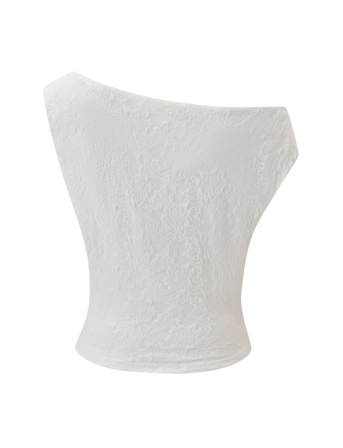 The MAVEN LACE TOP - IVORY by TIGERMIST is a white, sleeveless, one-shoulder textured crop top with a subtle floral pattern, shown against a plain white background.