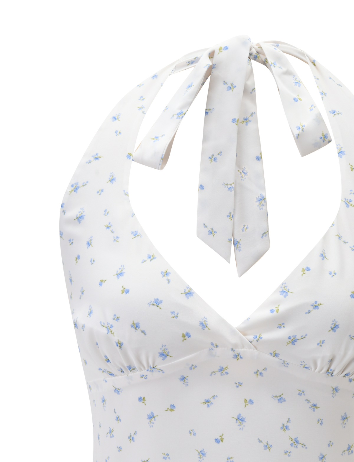 Close-up of the CALI TOP - DITSY FLORAL by TIGERMIST, a white halter neck top with blue ditsy floral print, deep V-neckline, ruched bust detail, and bow tie at the neck.