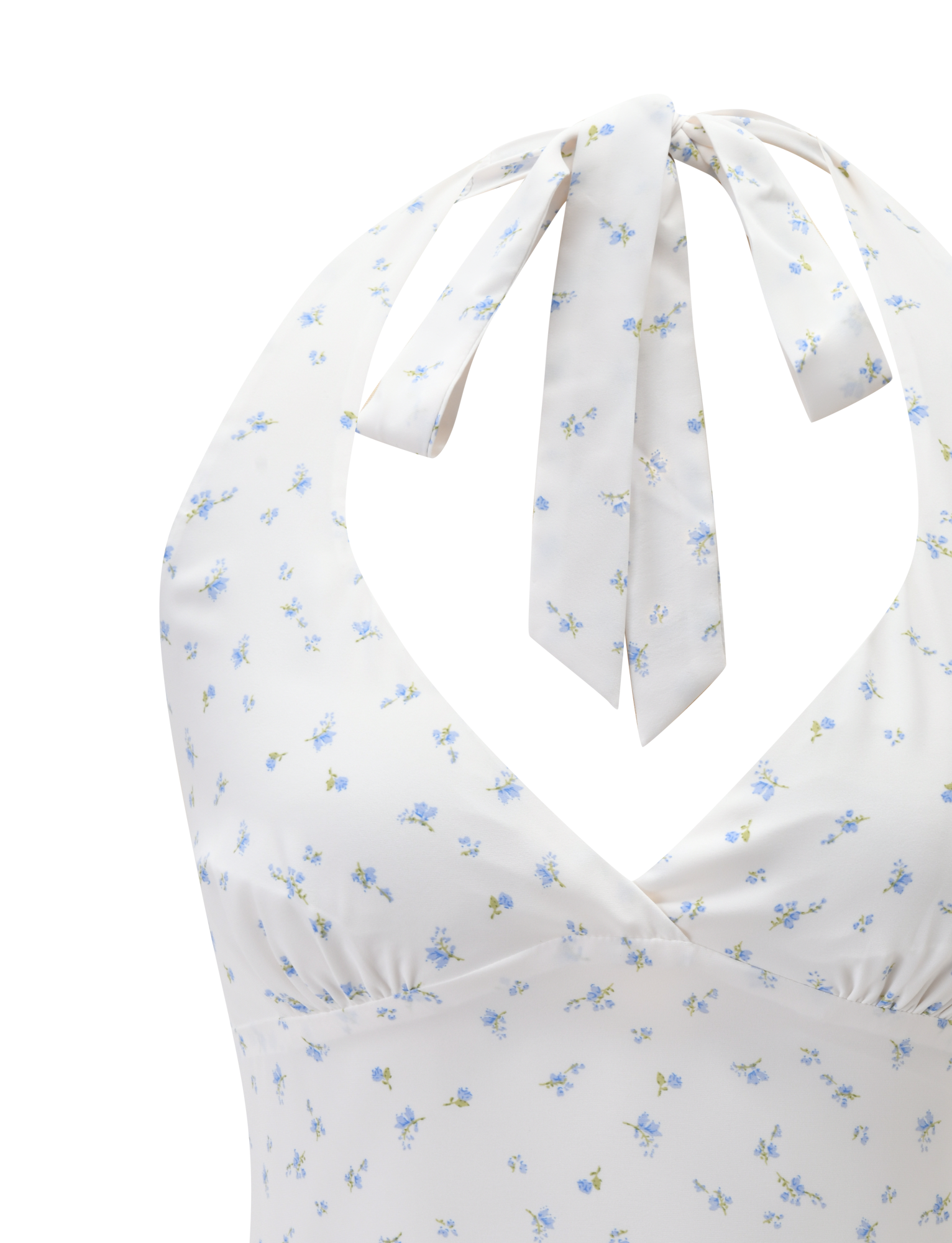 Close-up of the CALI TOP - DITSY FLORAL by TIGERMIST, a white halter neck top with blue ditsy floral print, deep V-neckline, ruched bust detail, and bow tie at the neck.