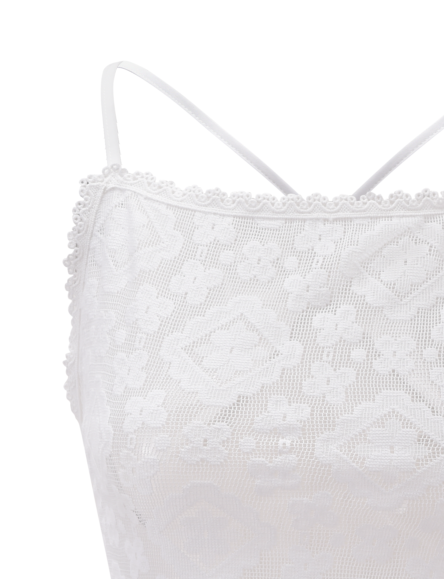 Close-up of the JESIRA TOP in off white by TIGERMIST, featuring thin straps and a delicate floral jacquard lace with scalloped trim for an elegant finish.