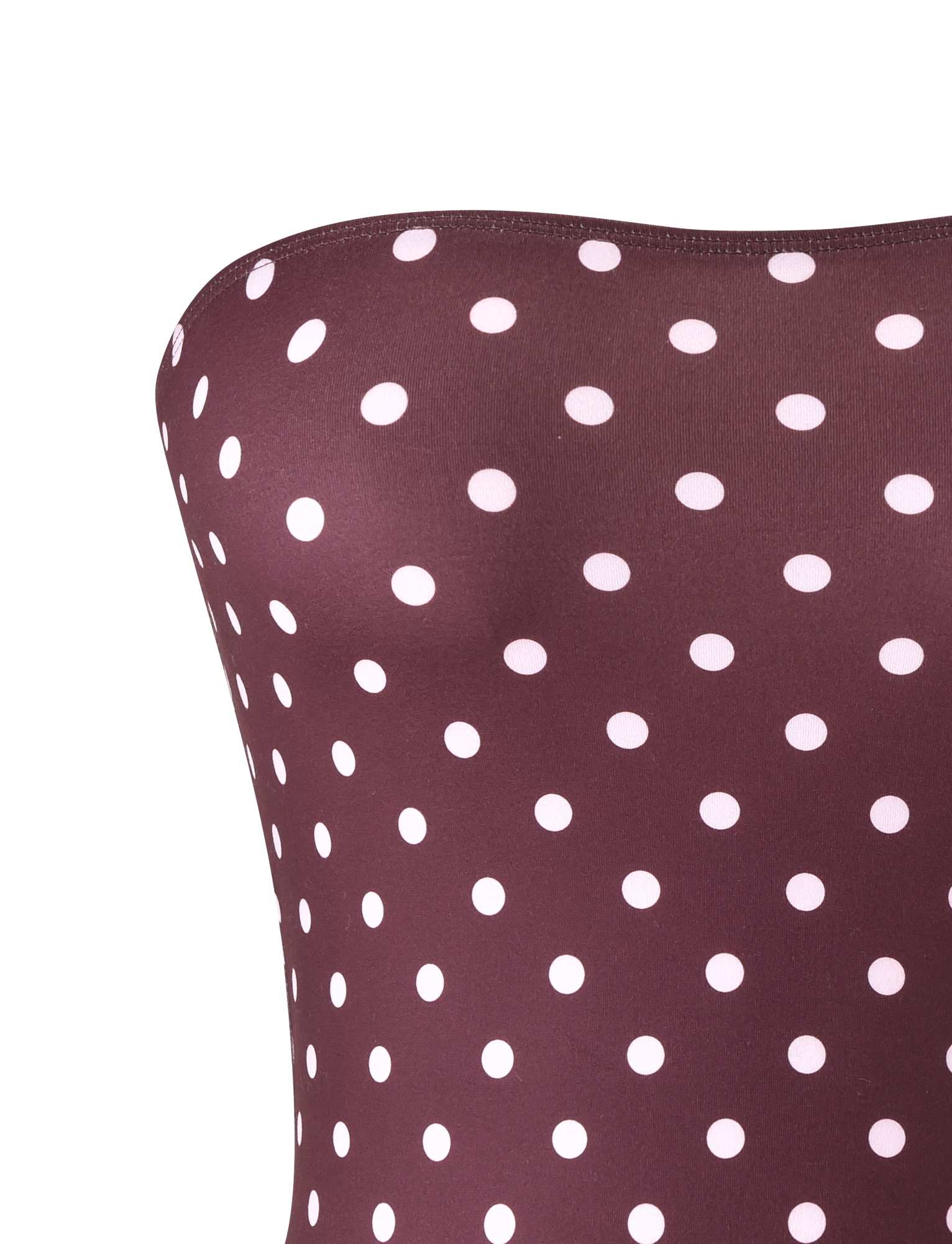 Close-up of the VALI POLKA DOT TOP by TIGERMIST in chocolate with pink dots, featuring a strapless fit secured by discreet gel tape for confidence, shown against a plain light background.