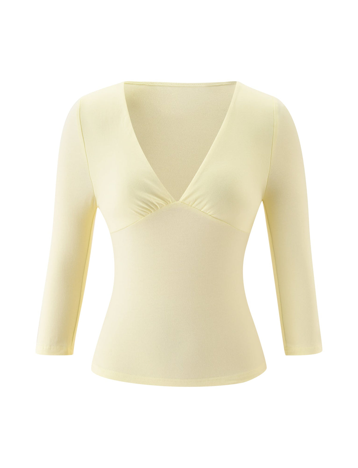 TIGERMIST SANDI TOP in butter yellow, a long-sleeve fitted women's brunch top featuring a deep V-neckline and subtle ruching under the bust, displayed on a white background.