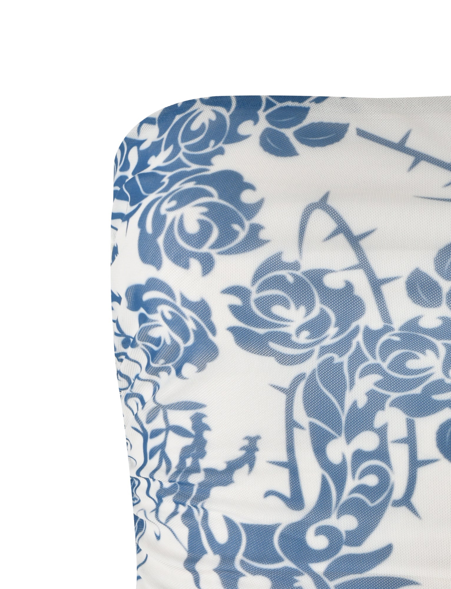A close-up of the TIGERMIST HARRIETT TUBE TOP in blue, featuring an intricate tattoo print. The detailed floral design comprises roses and thorny vines against a white background, focusing on the upper left section of the fabric for an elegant and refined look.