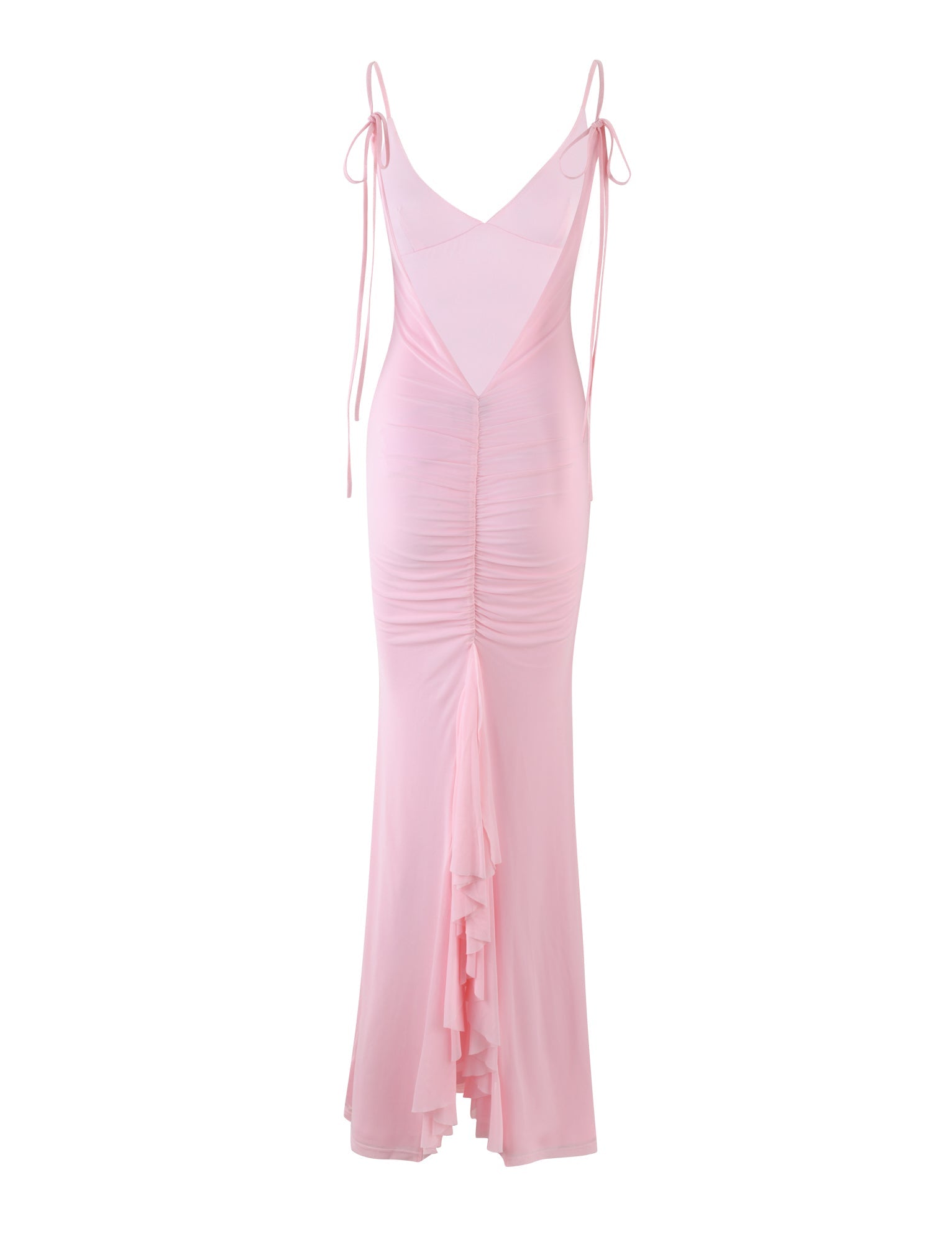 The KYLAH DRESS in BABY PINK by TIGERMIST is a floor-length masterpiece featuring a deep V-neck back, spaghetti straps tied at the shoulders, and gathered fabric that creates a ruched effect down the center. The dress showcases a cascading ruffle at the back, adding texture and movement.